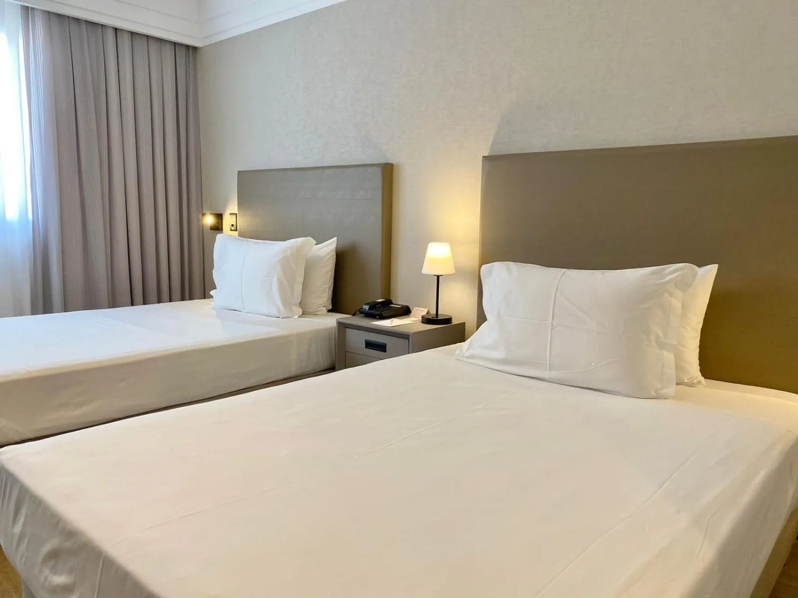 Bed in Radisson Alphaville