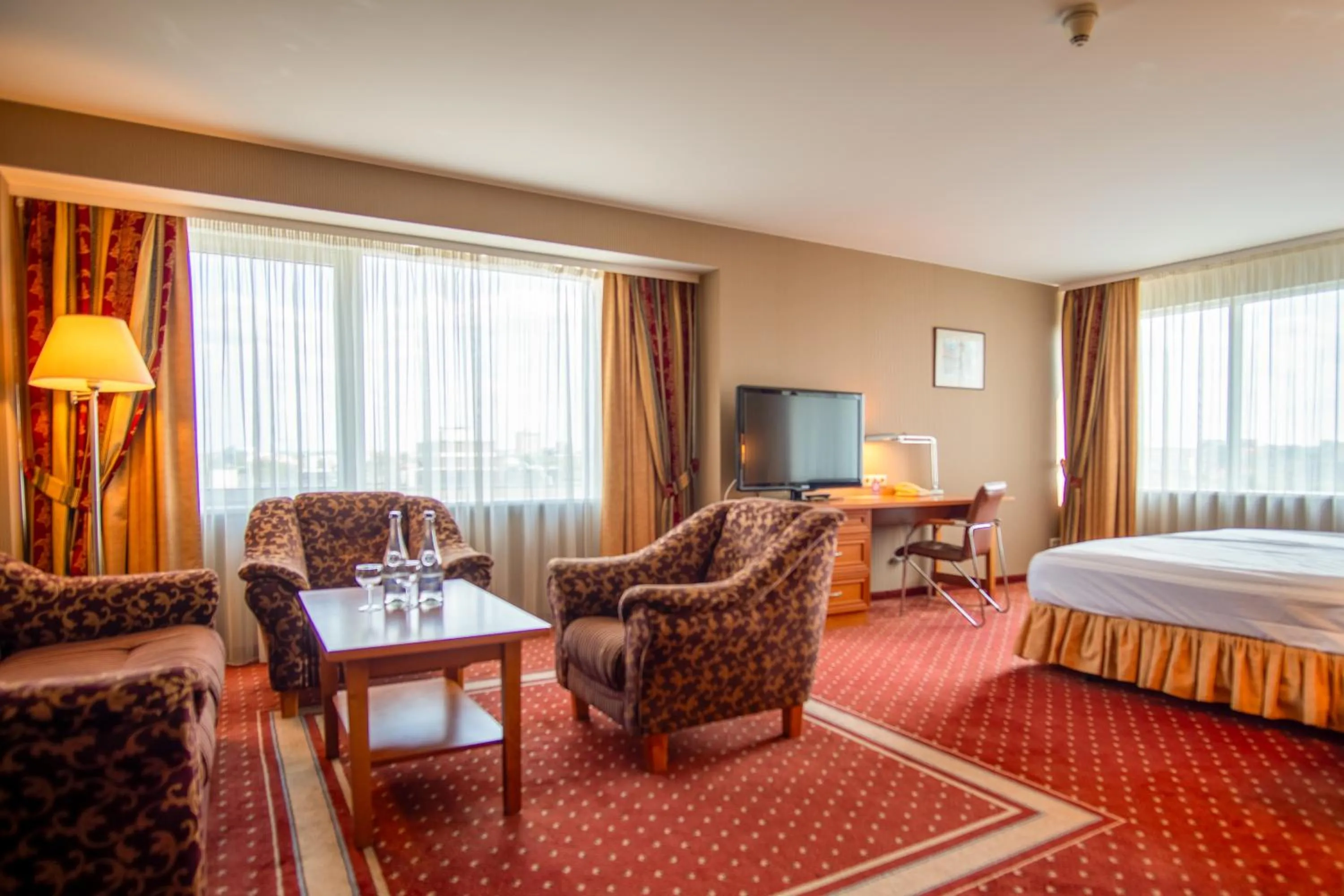 Photo of the whole room, Bed in VILNIUS PARK PLAZA HOTEL, Restaurant & Terrace, Panorama Bar, Conference & Banquet Center