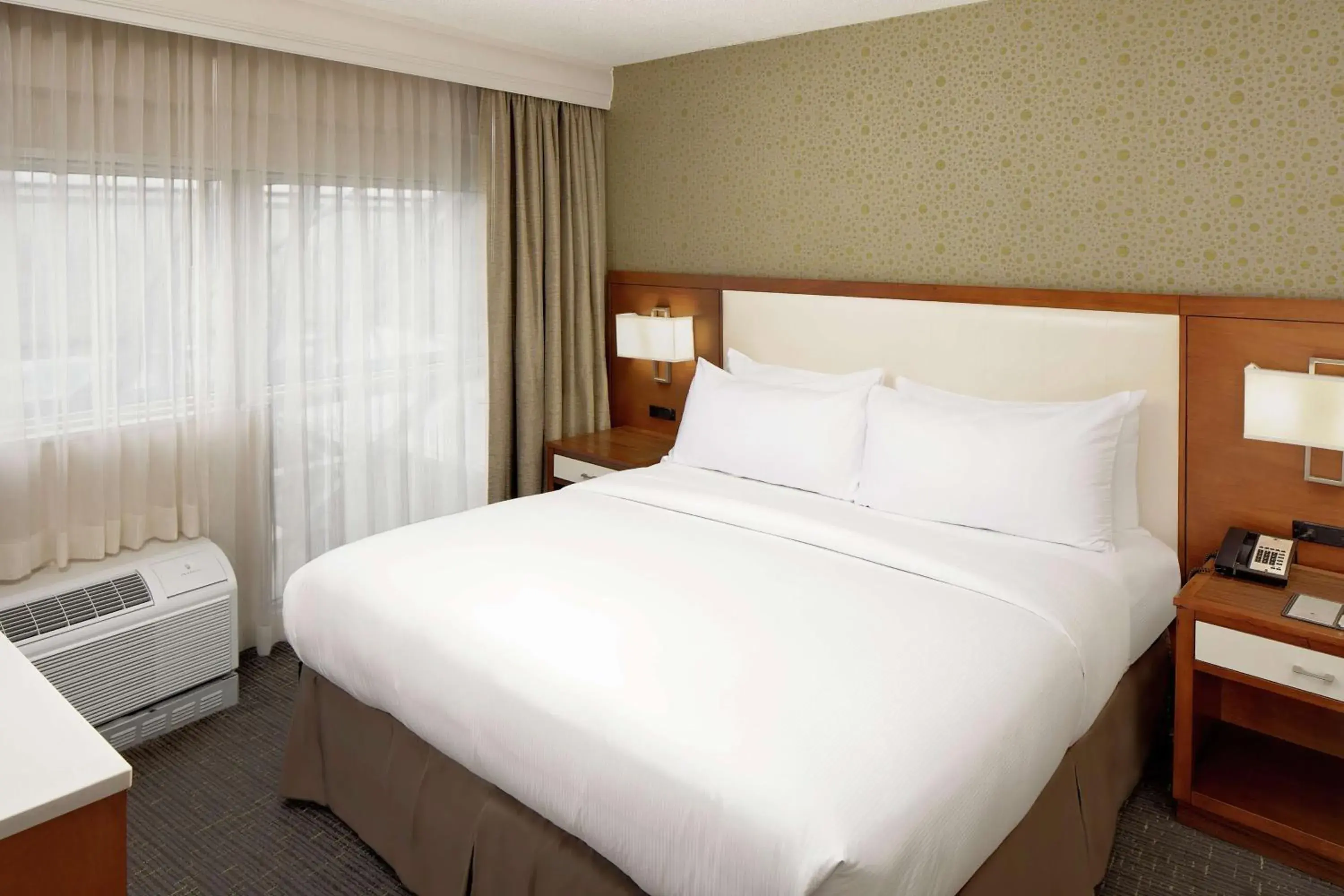 Junior King Suite - single occupancy - Non-Smoking in DoubleTree by Hilton Hotel South Bend Junior King Suite - single occupancy - Non-Smoking in DoubleTree by Hilton Hotel South Bend