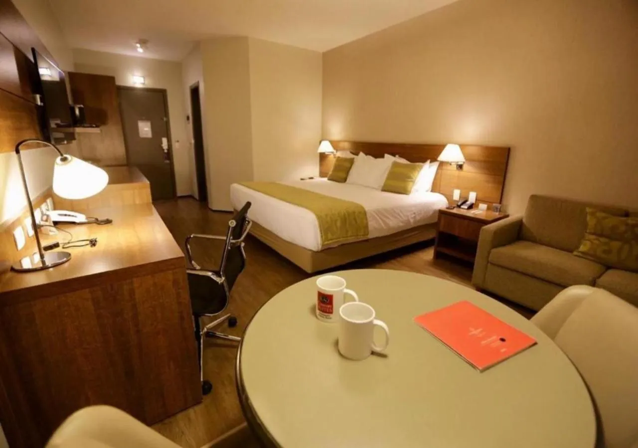 Bed in Comfort Suites Flamboyant Goiânia