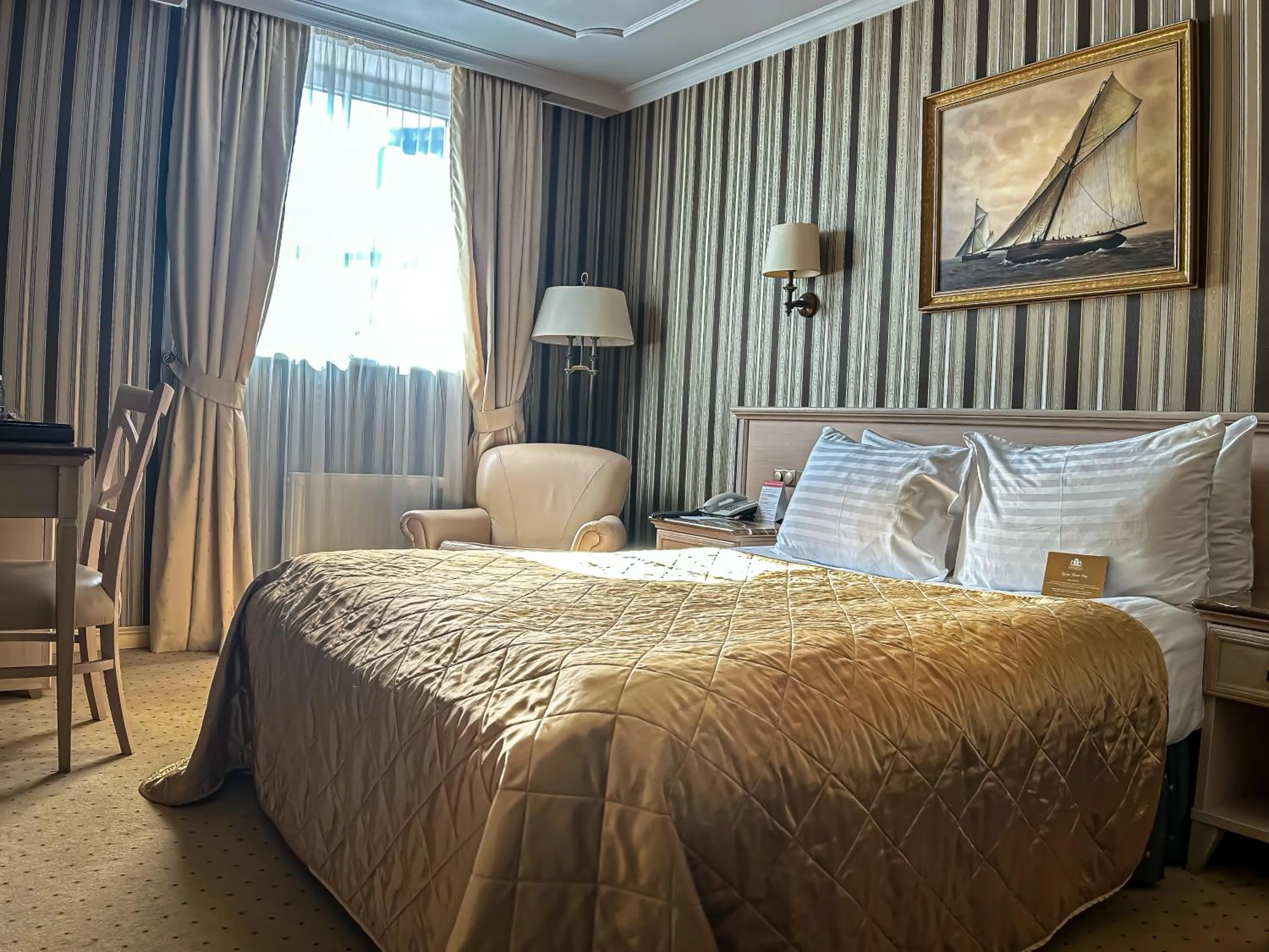 Photo of the whole room, Bed in Imperial Hotel & Restaurant