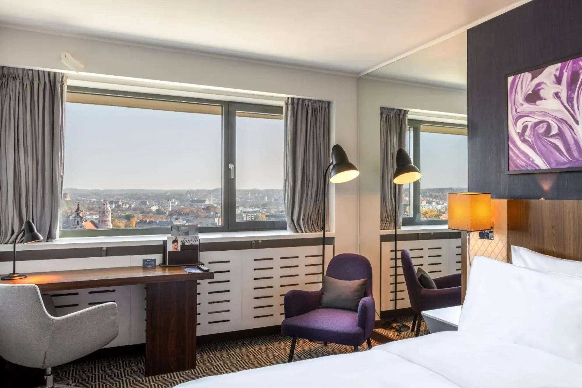 Landmark view, Bed in Radisson Blu Hotel Lietuva Landmark view, Bed in Radisson Blu Hotel Lietuva