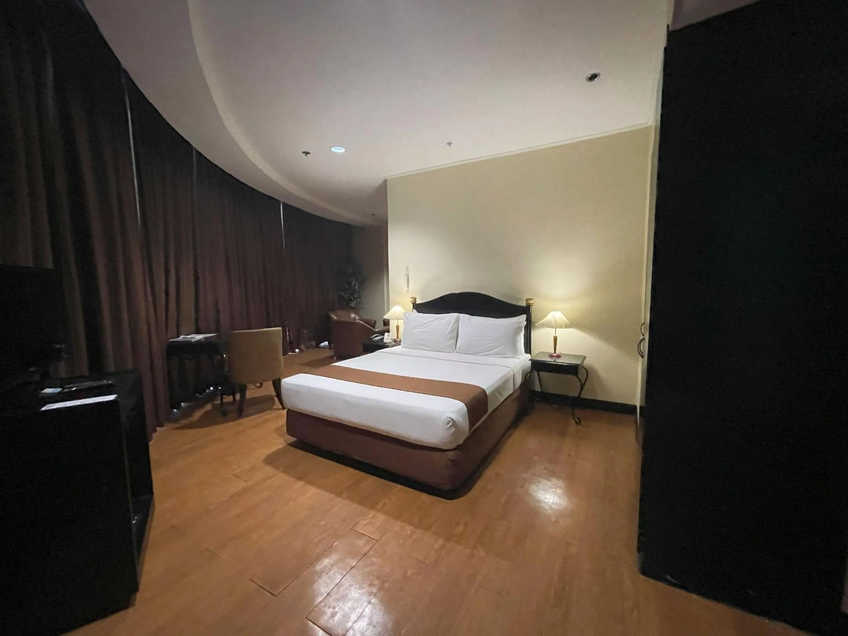 Bed in Golden Peak Hotel & Suites powered by Cocotel