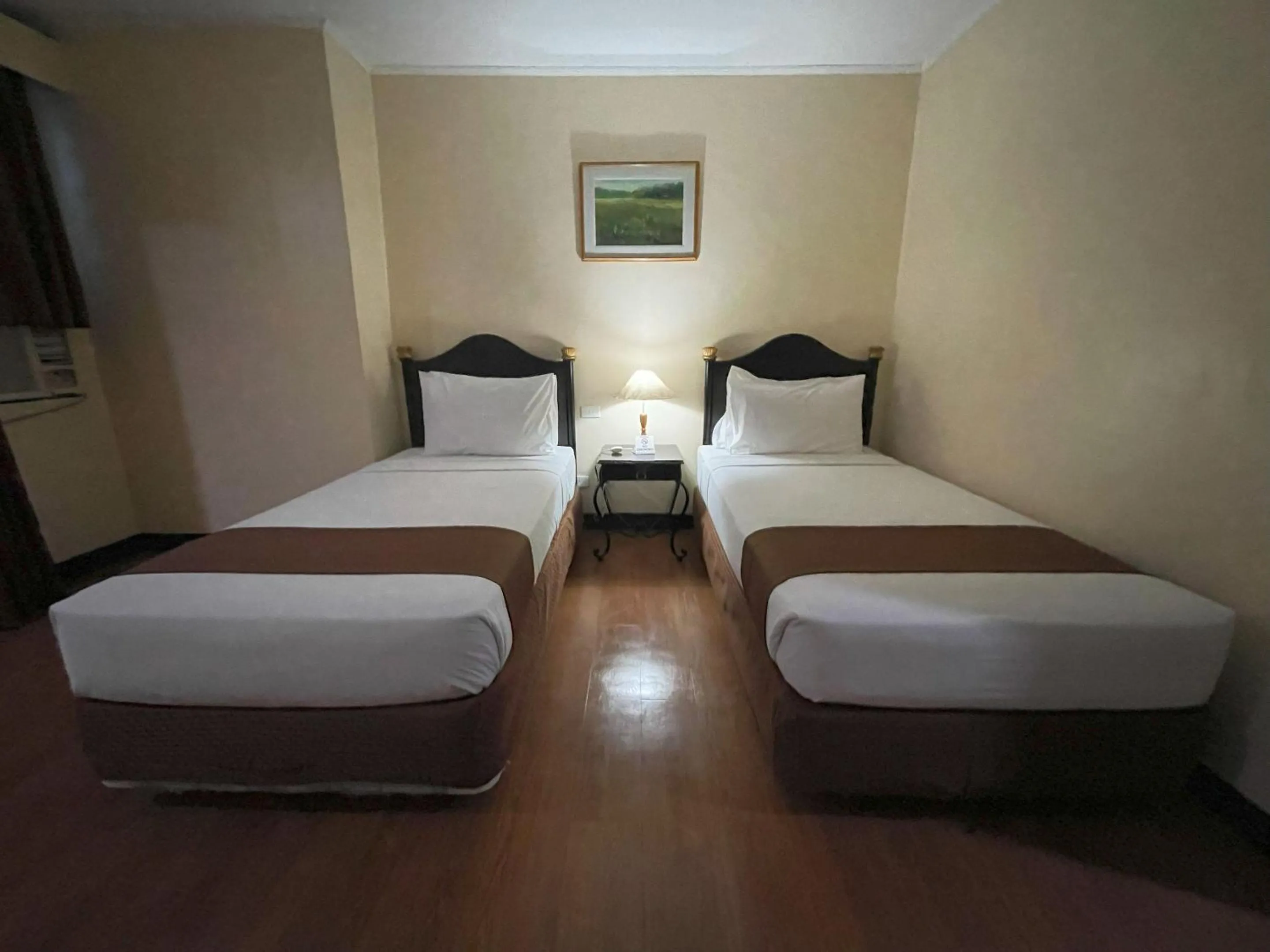Bed in Golden Peak Hotel & Suites powered by Cocotel