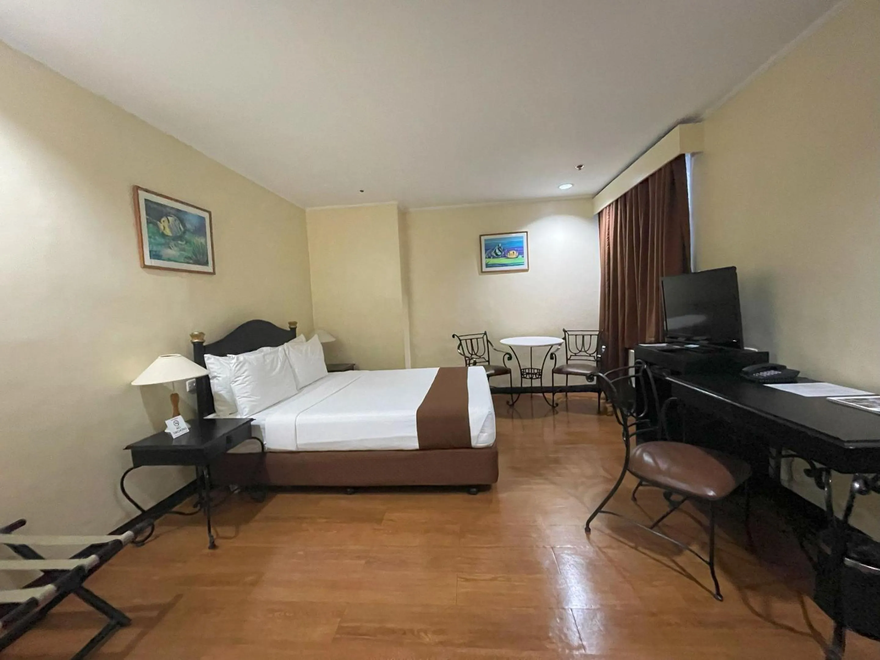 Bed in Golden Peak Hotel & Suites powered by Cocotel