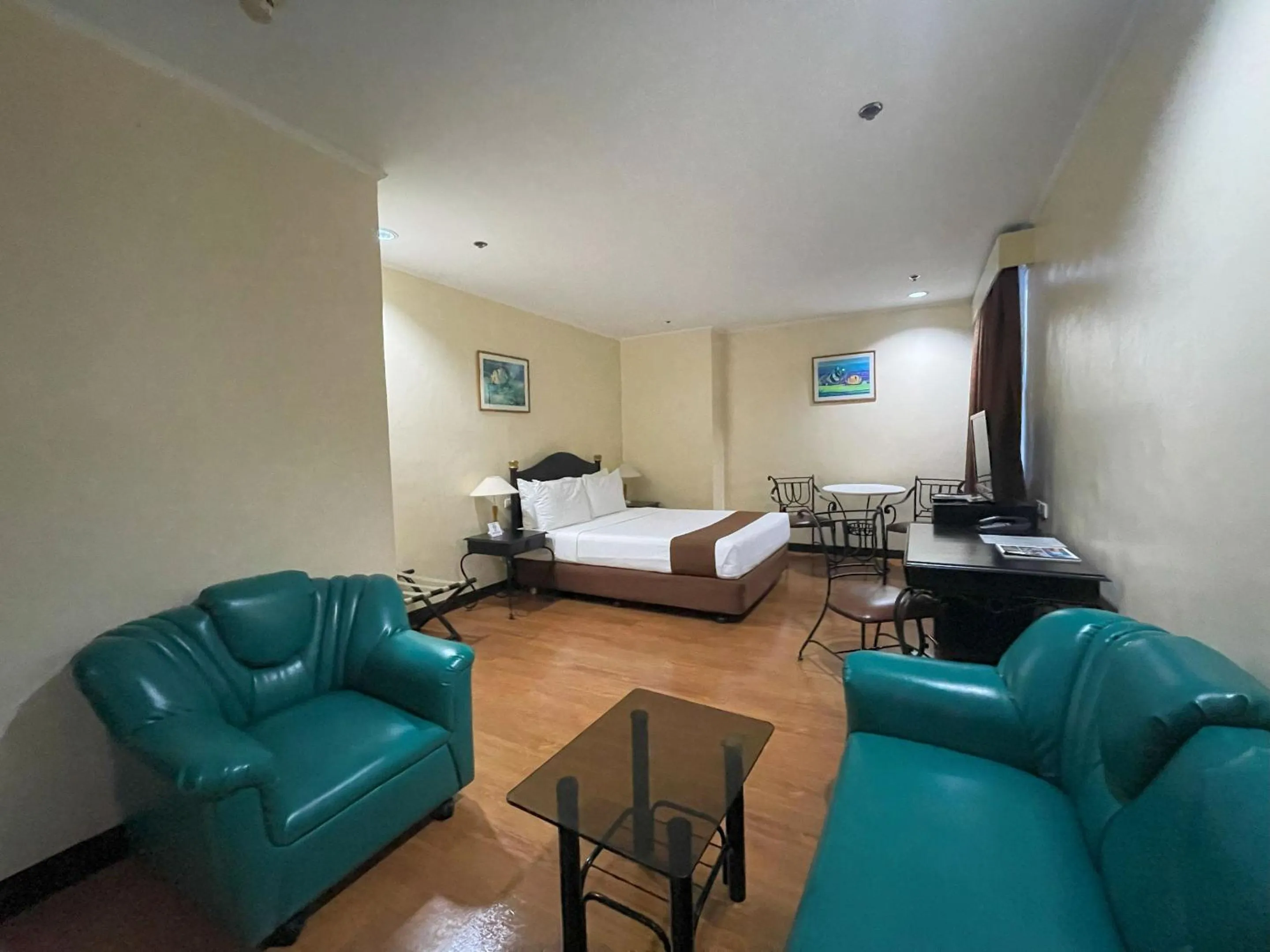 Bed in Golden Peak Hotel & Suites powered by Cocotel