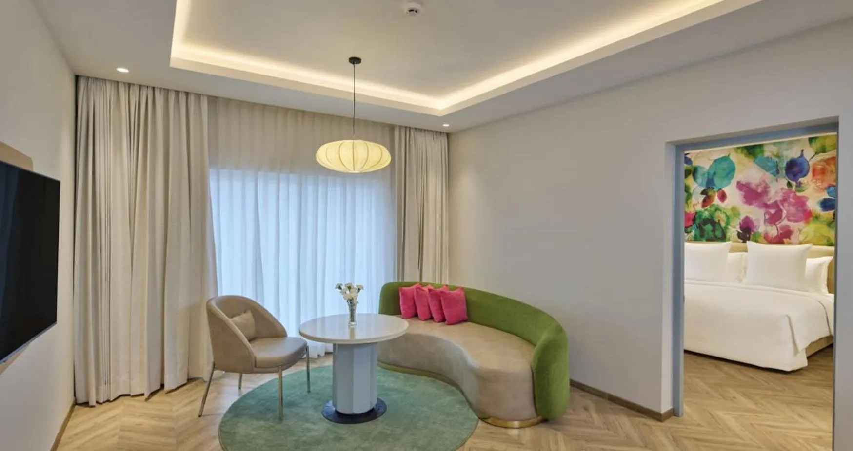 Living room, Bed in Hotel Royal Orchid Bangalore