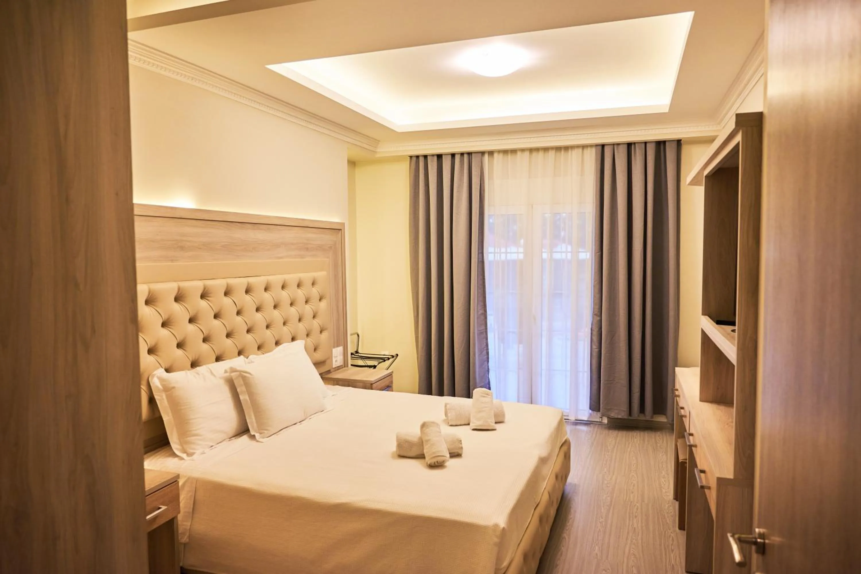 Bed in Famissi Eden Hotel