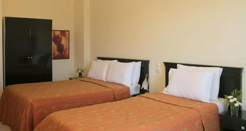 Bed in Famissi Eden Hotel