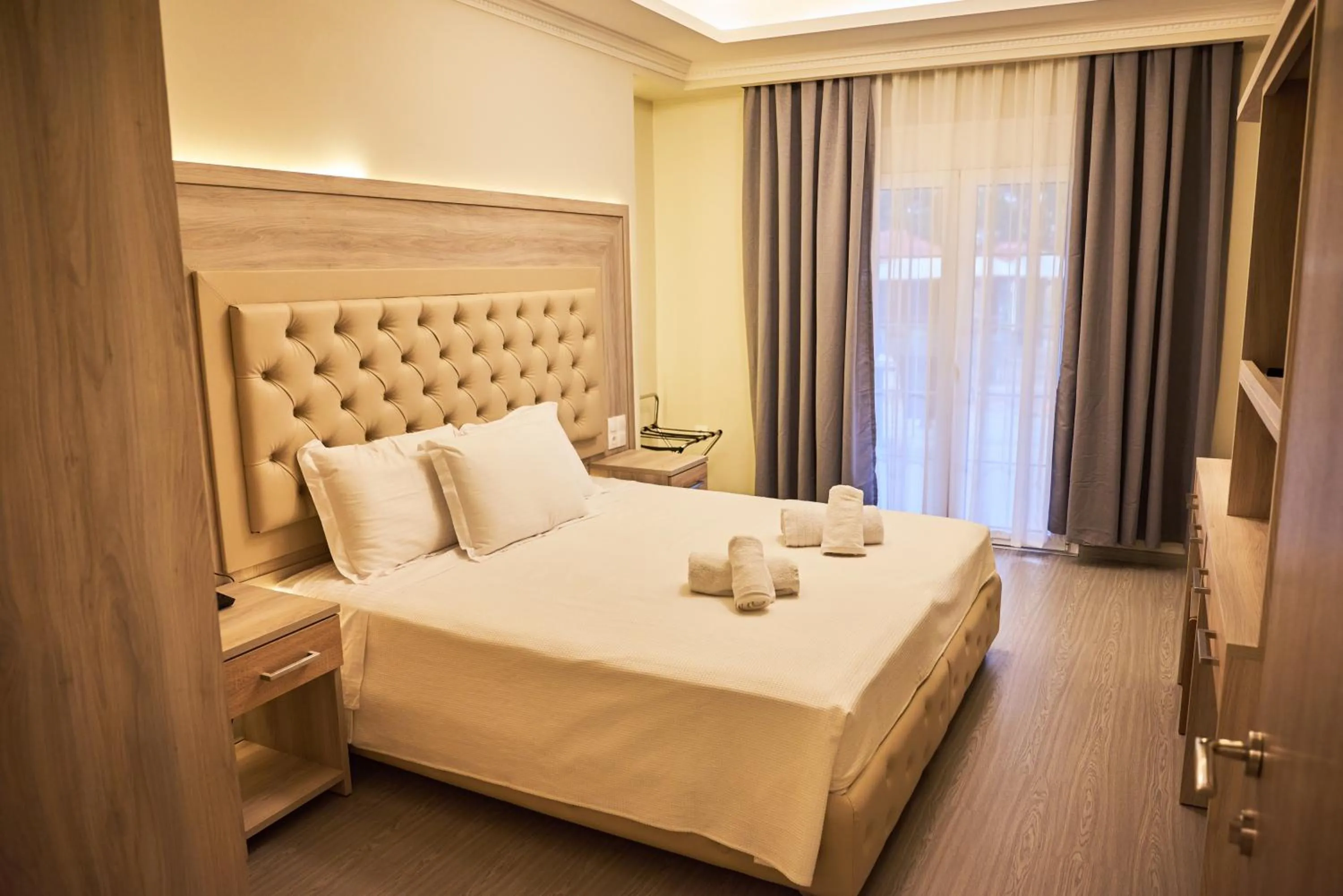 Bed in Famissi Eden Hotel