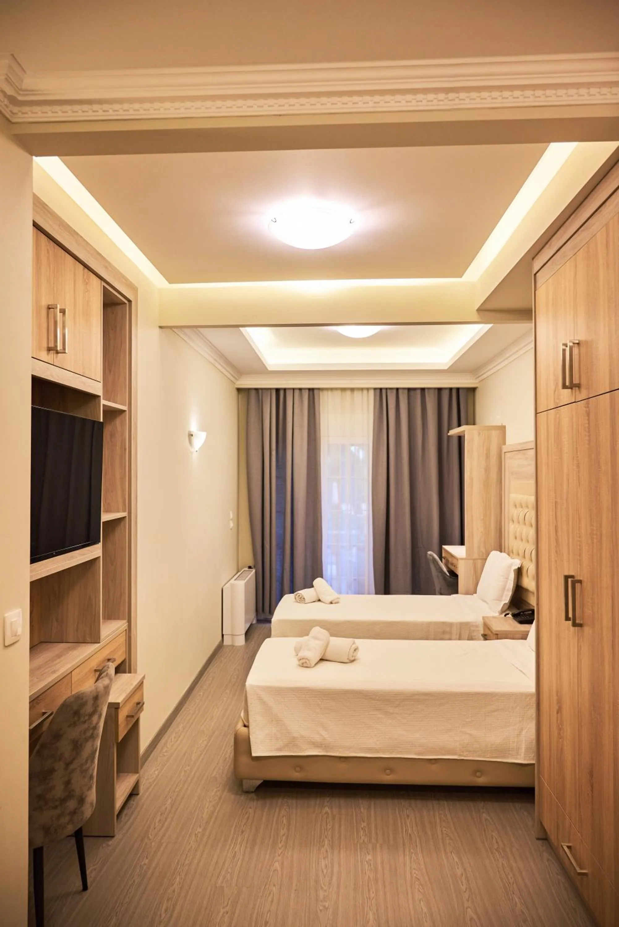 Bed in Famissi Eden Hotel