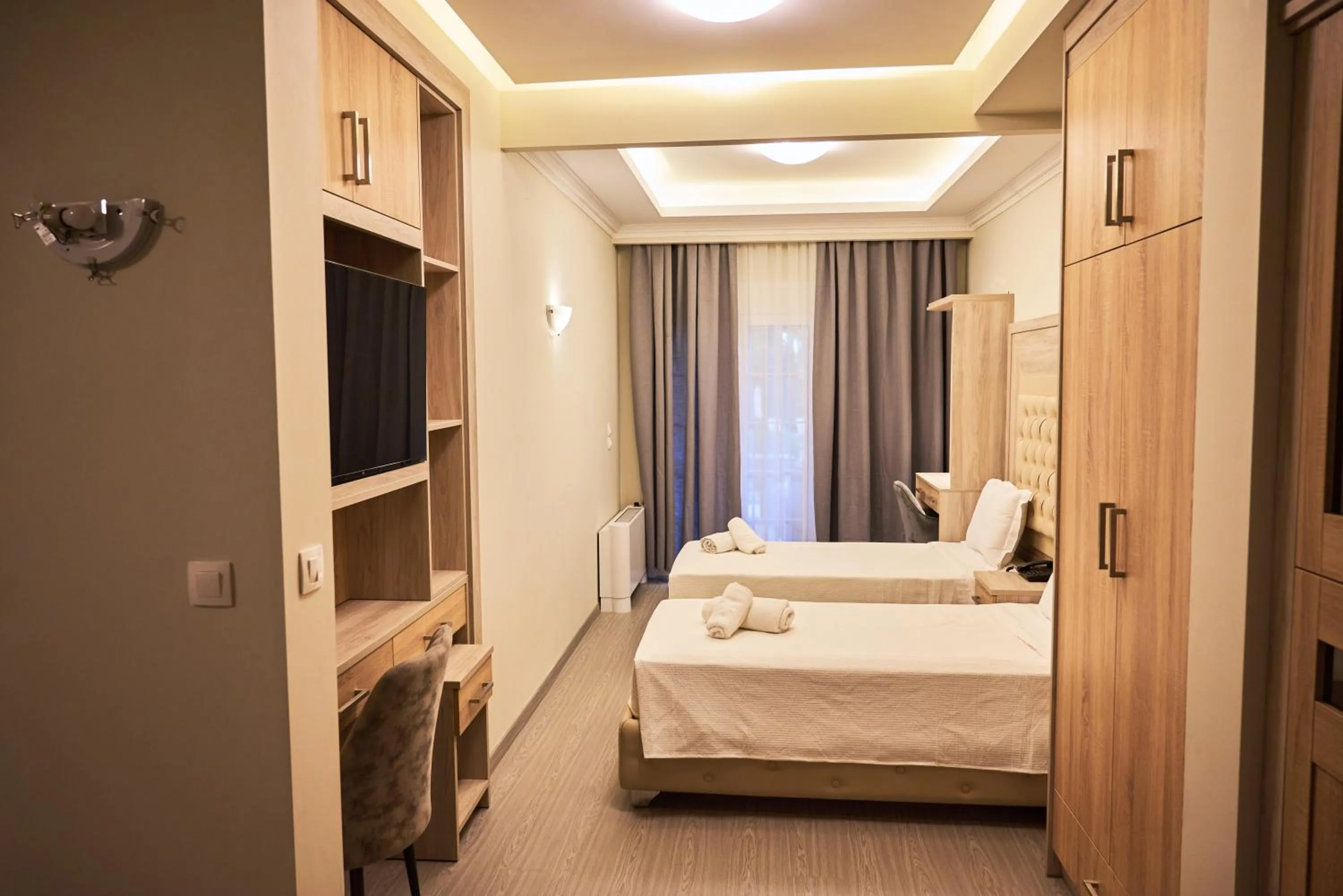 Bed in Famissi Eden Hotel