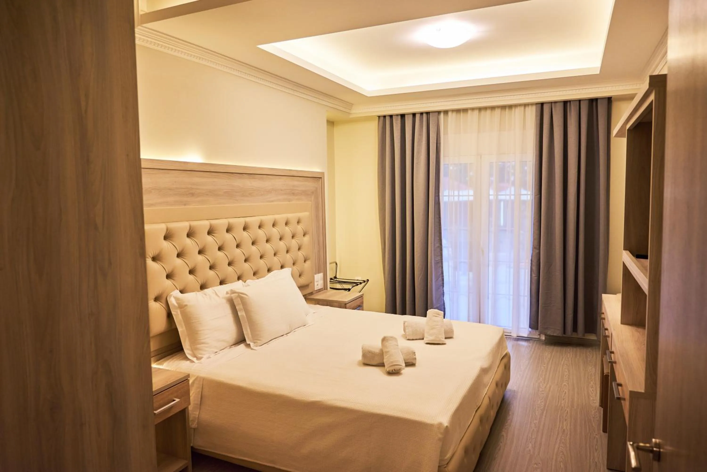 Bed in Famissi Eden Hotel