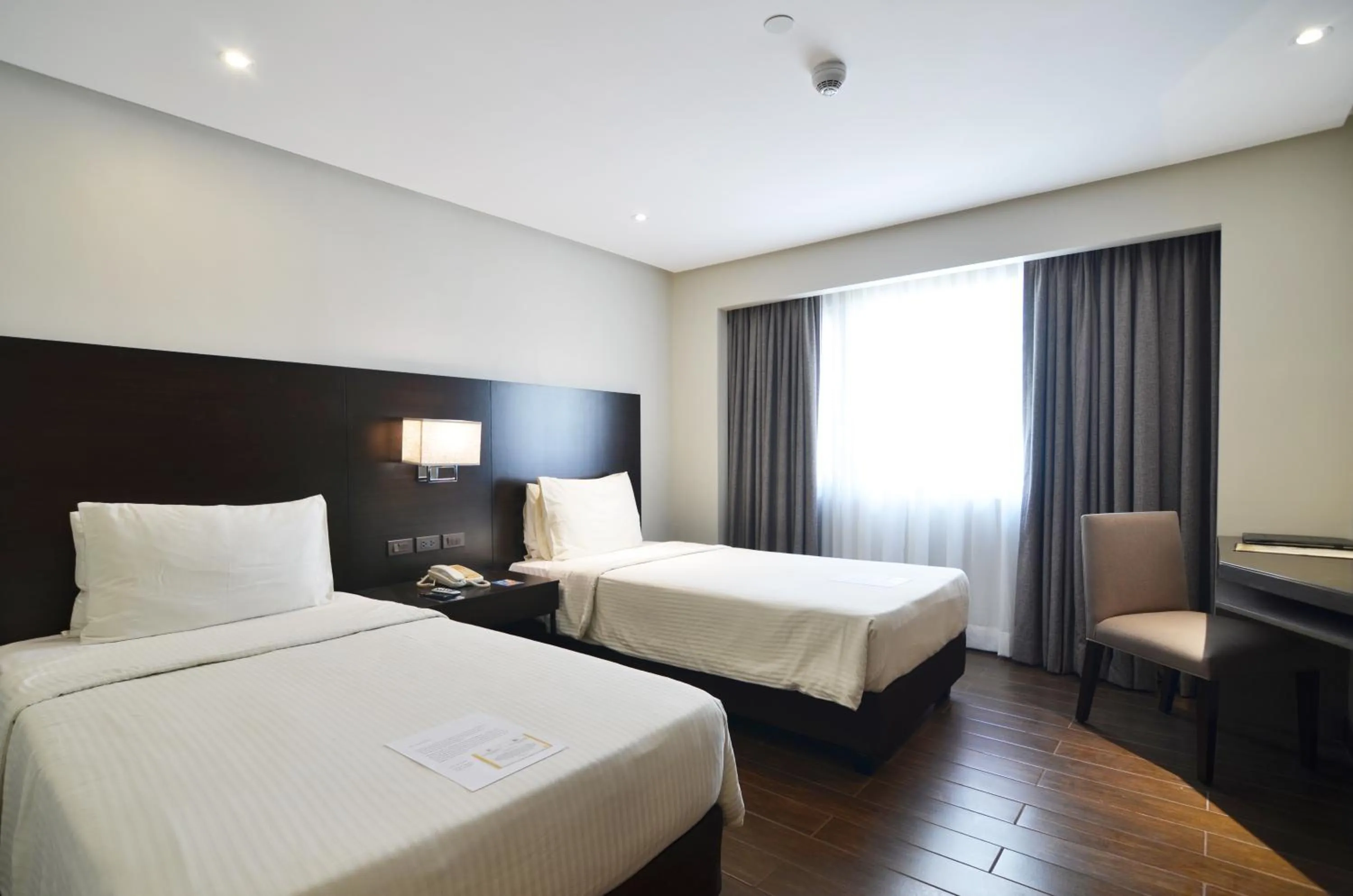 Bed in Pearl Garden Hotel