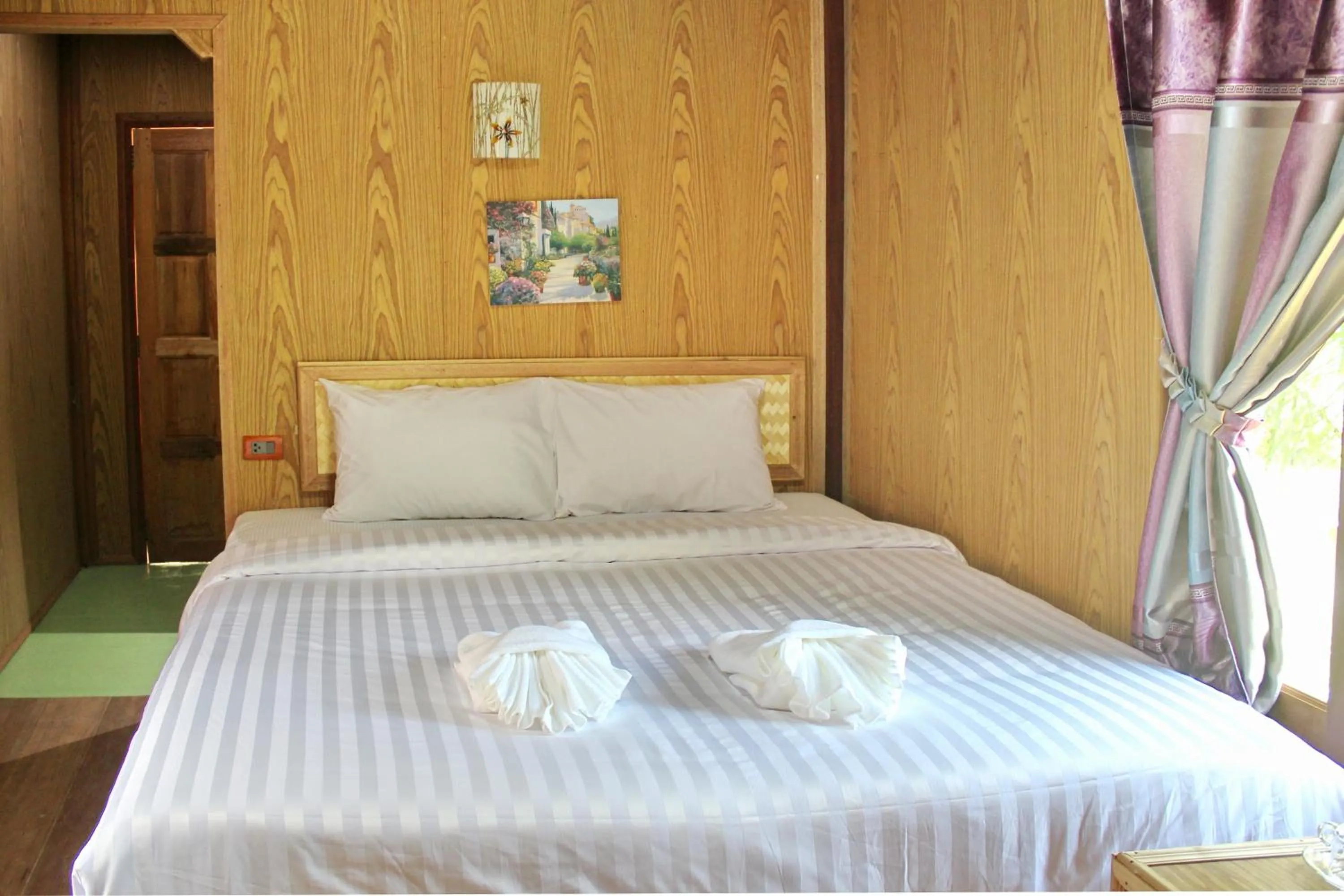 Bed in YaoIsland Resort and Farm