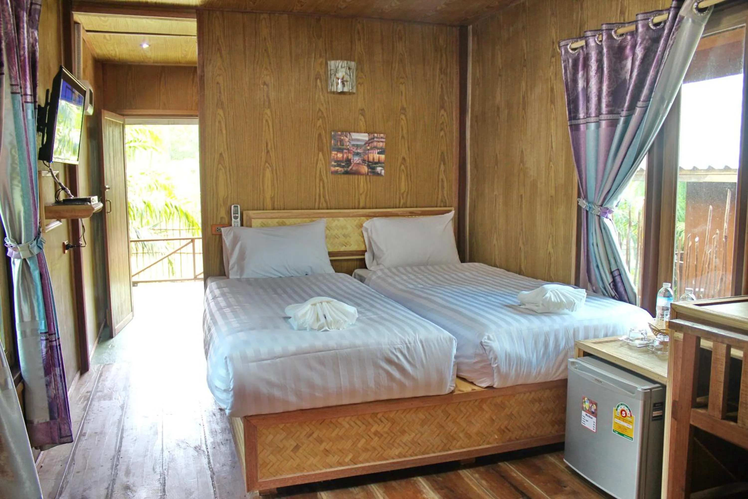 Bed in YaoIsland Resort and Farm