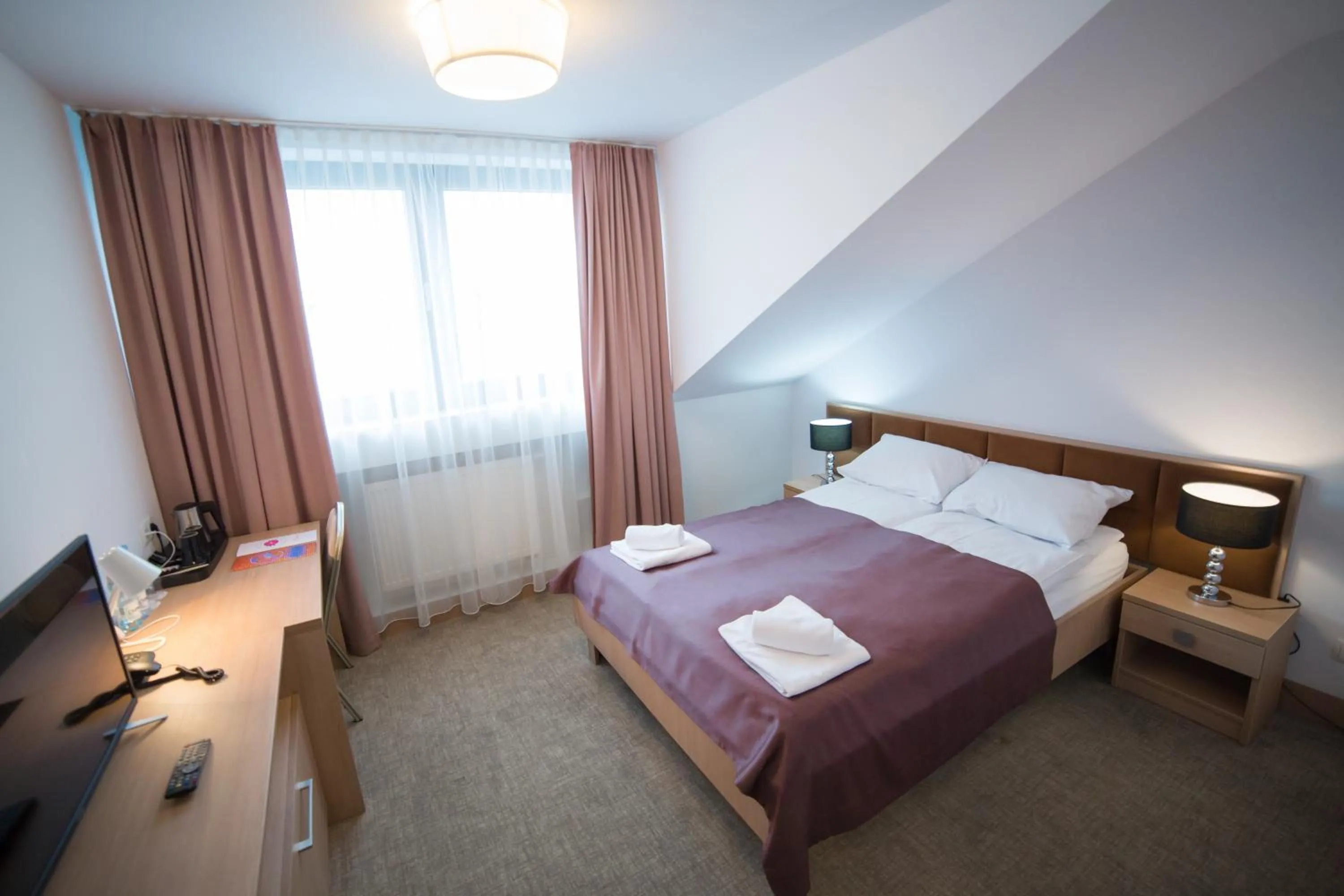 Photo of the whole room, Bed in Hotel Avangarda