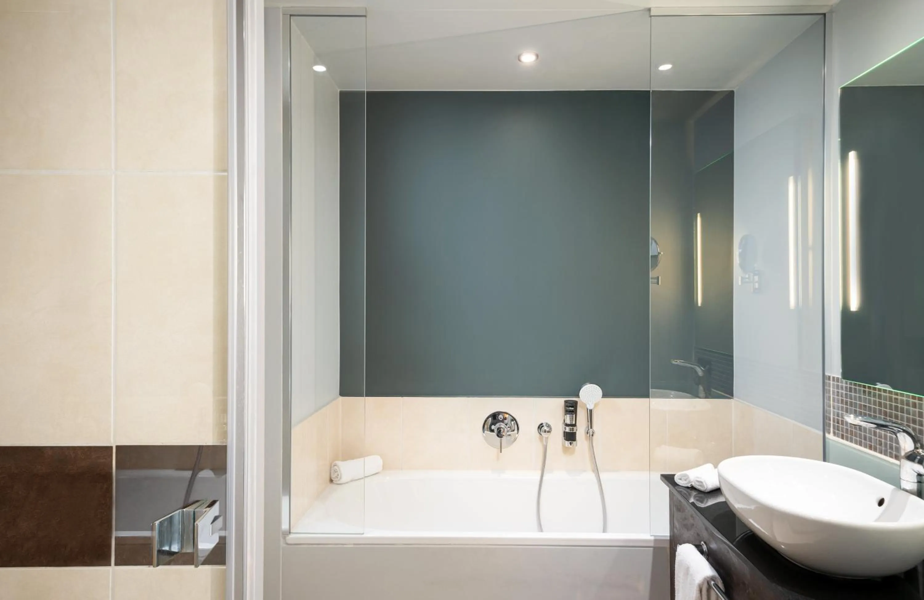 Bathroom in Leonardo Royal Hotel Munich