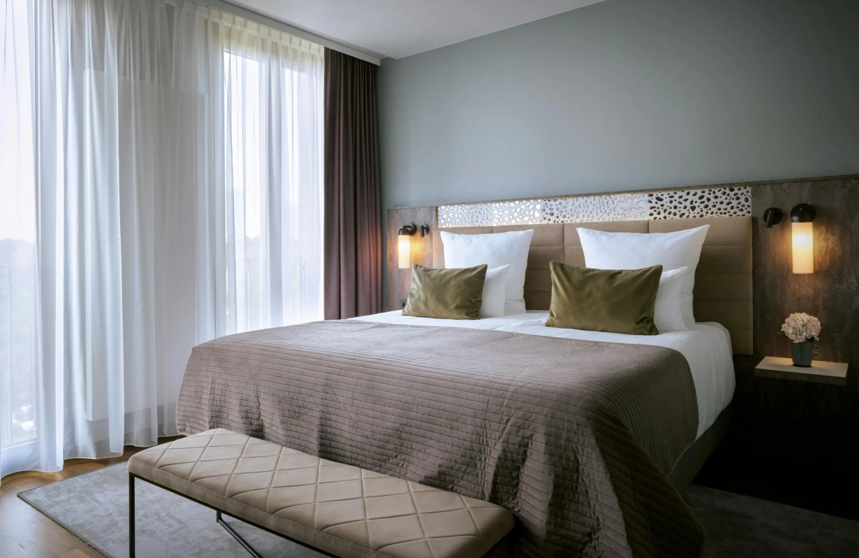 Photo of the whole room, Bed in Leonardo Royal Hotel Munich