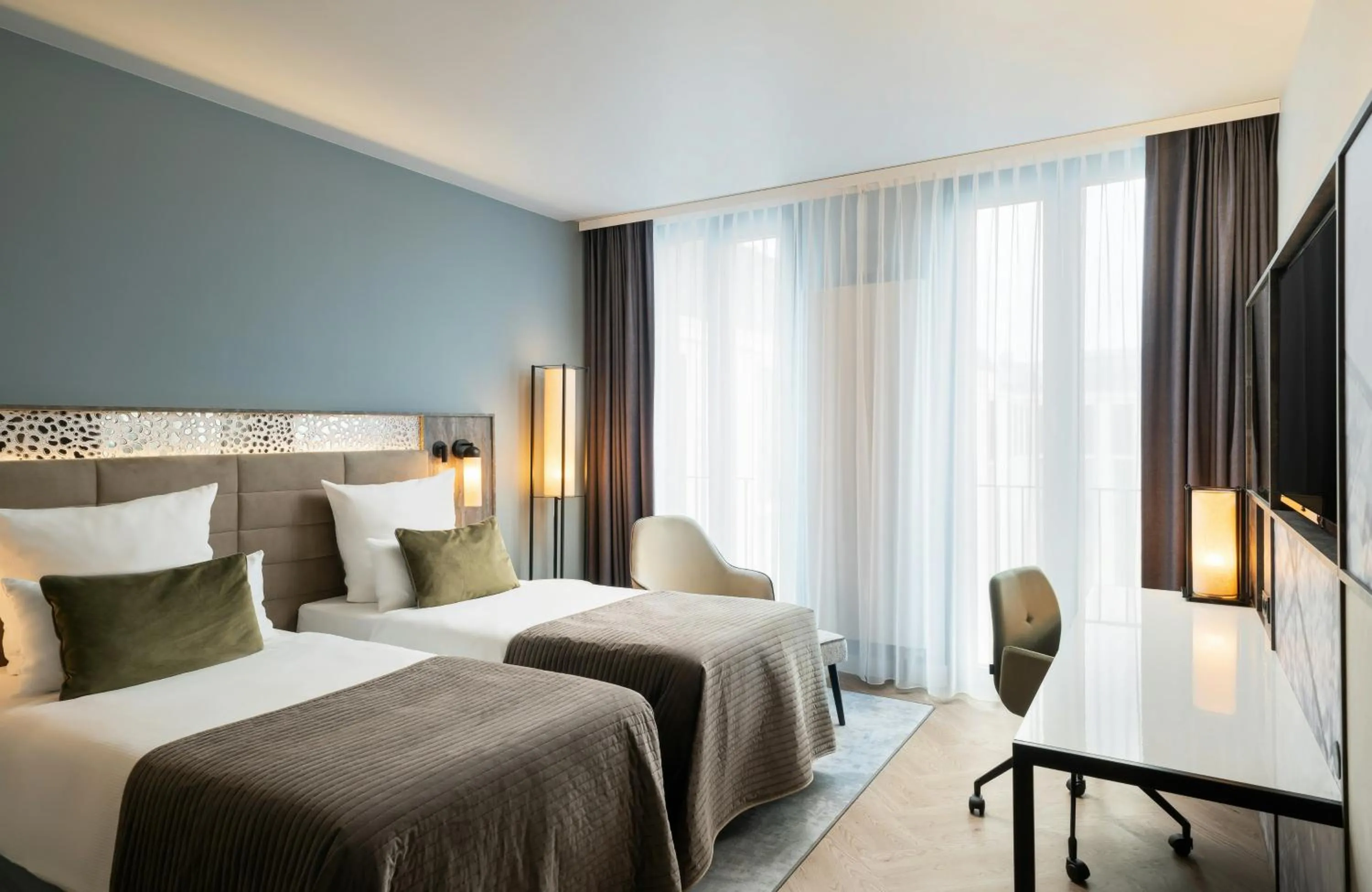 Photo of the whole room, Bed in Leonardo Royal Hotel Munich