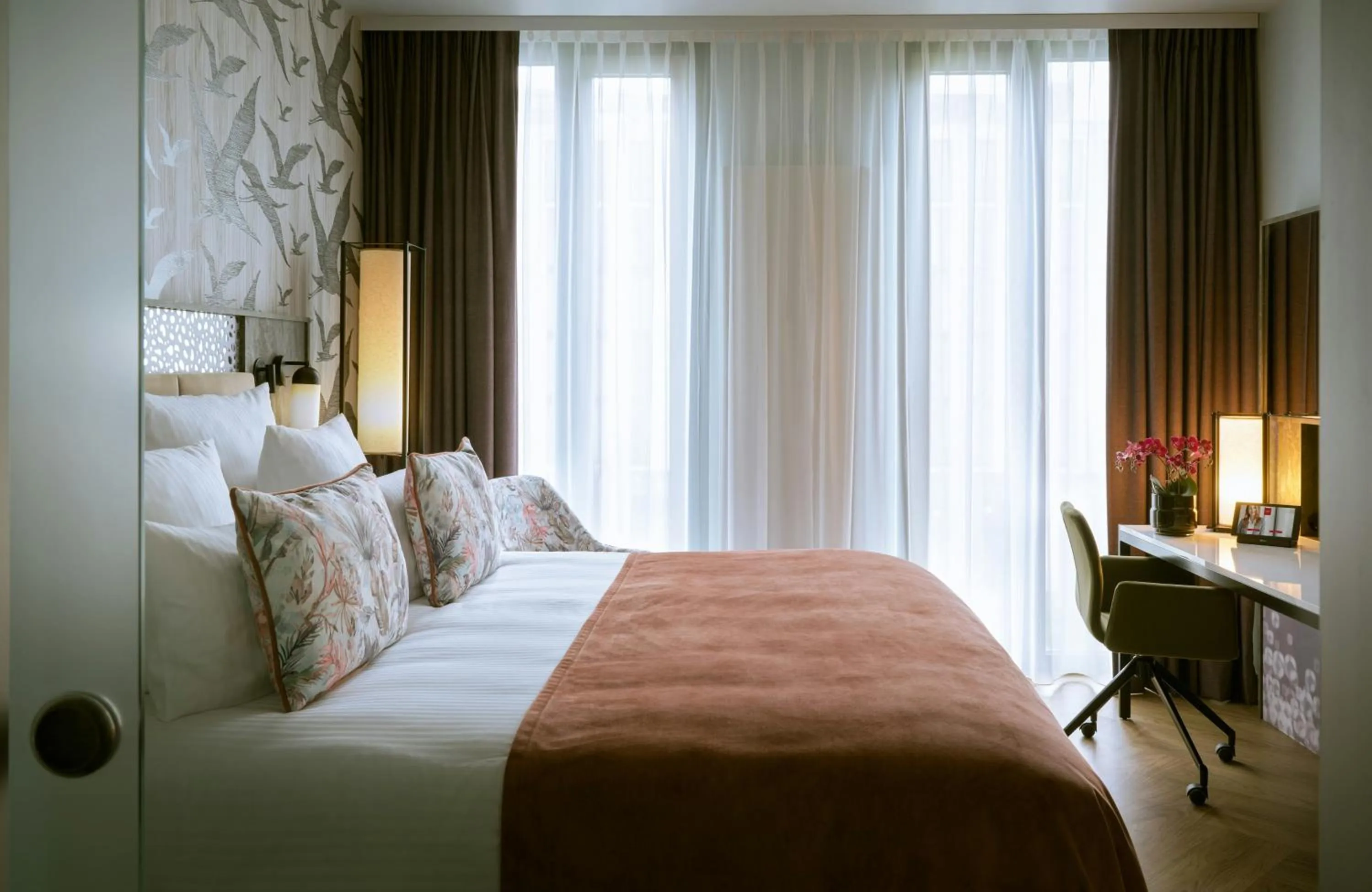 Photo of the whole room, Bed in Leonardo Royal Hotel Munich