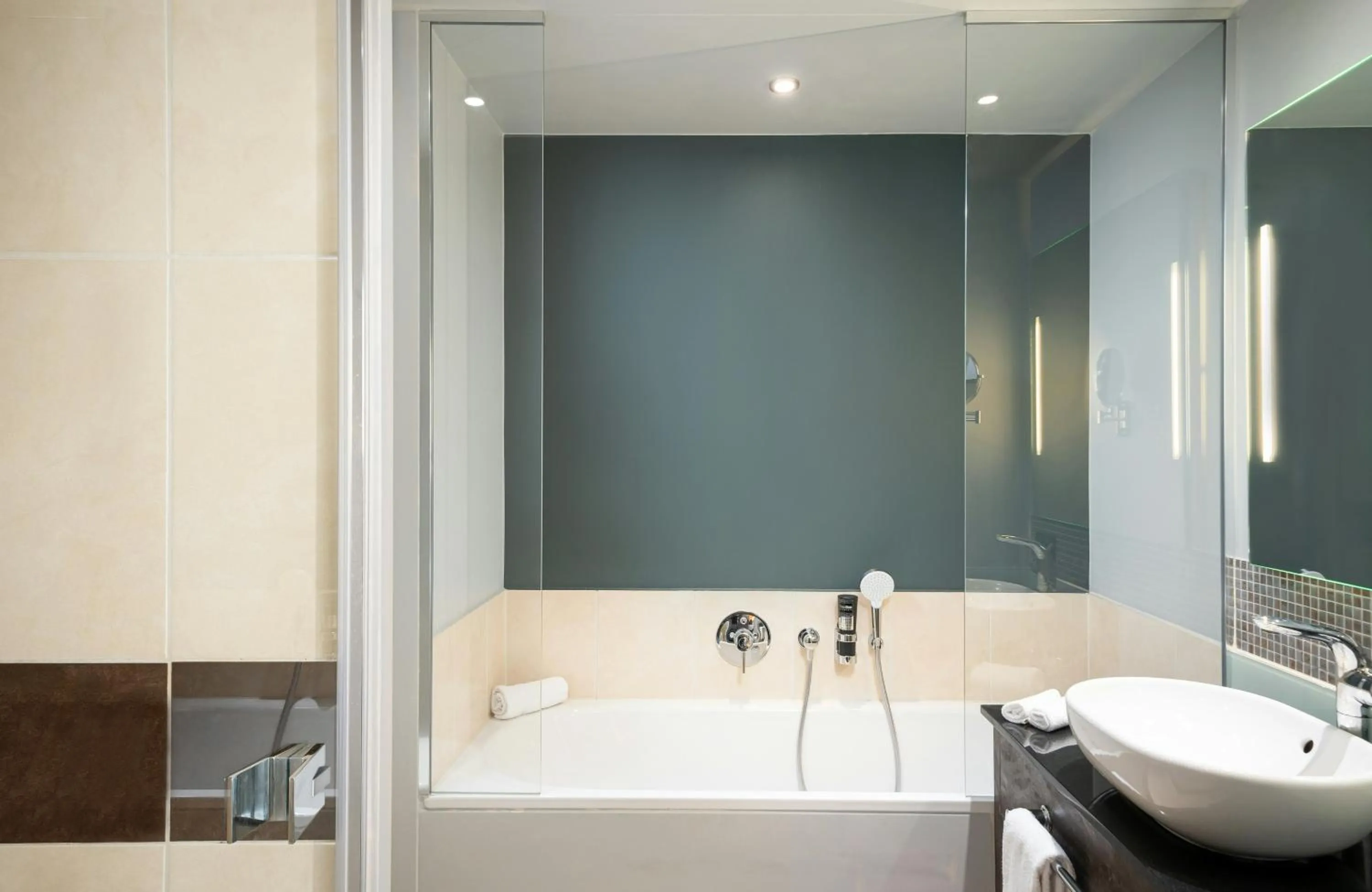 Bathroom in Leonardo Royal Hotel Munich