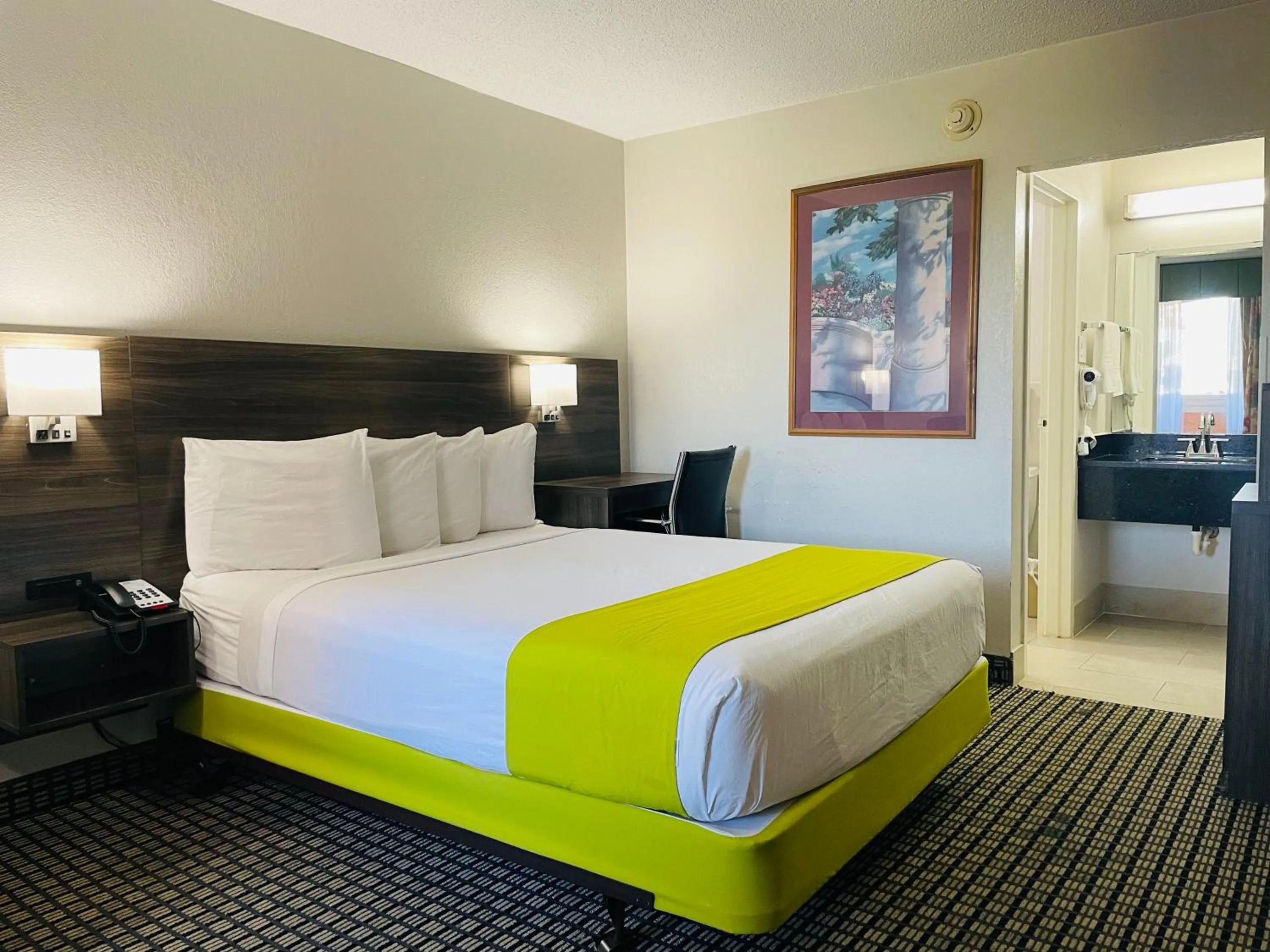 Bed in Days Inn by Wyndham Irving Grapevine DFW Airport North