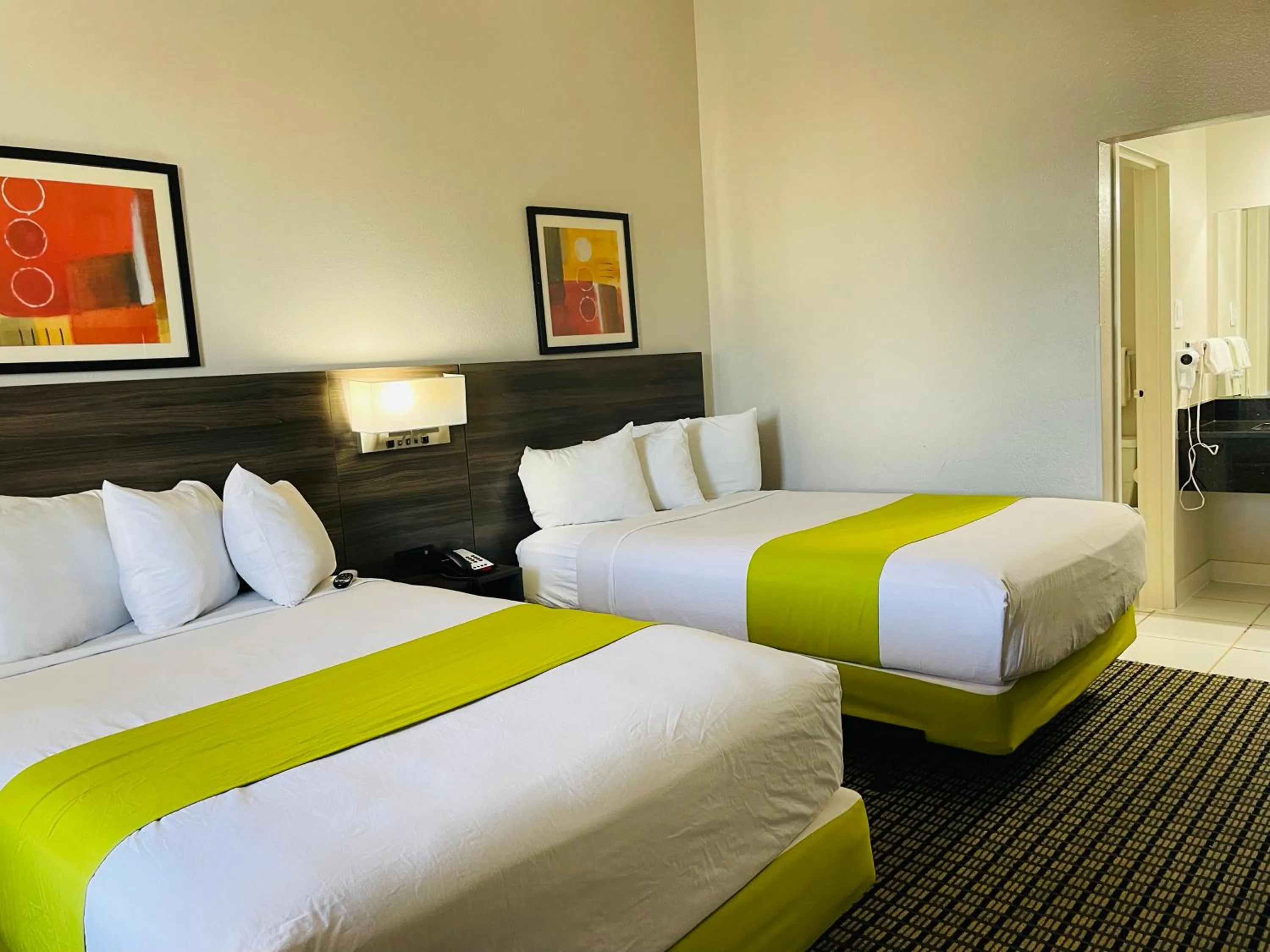 Bed in Days Inn by Wyndham Irving Grapevine DFW Airport North