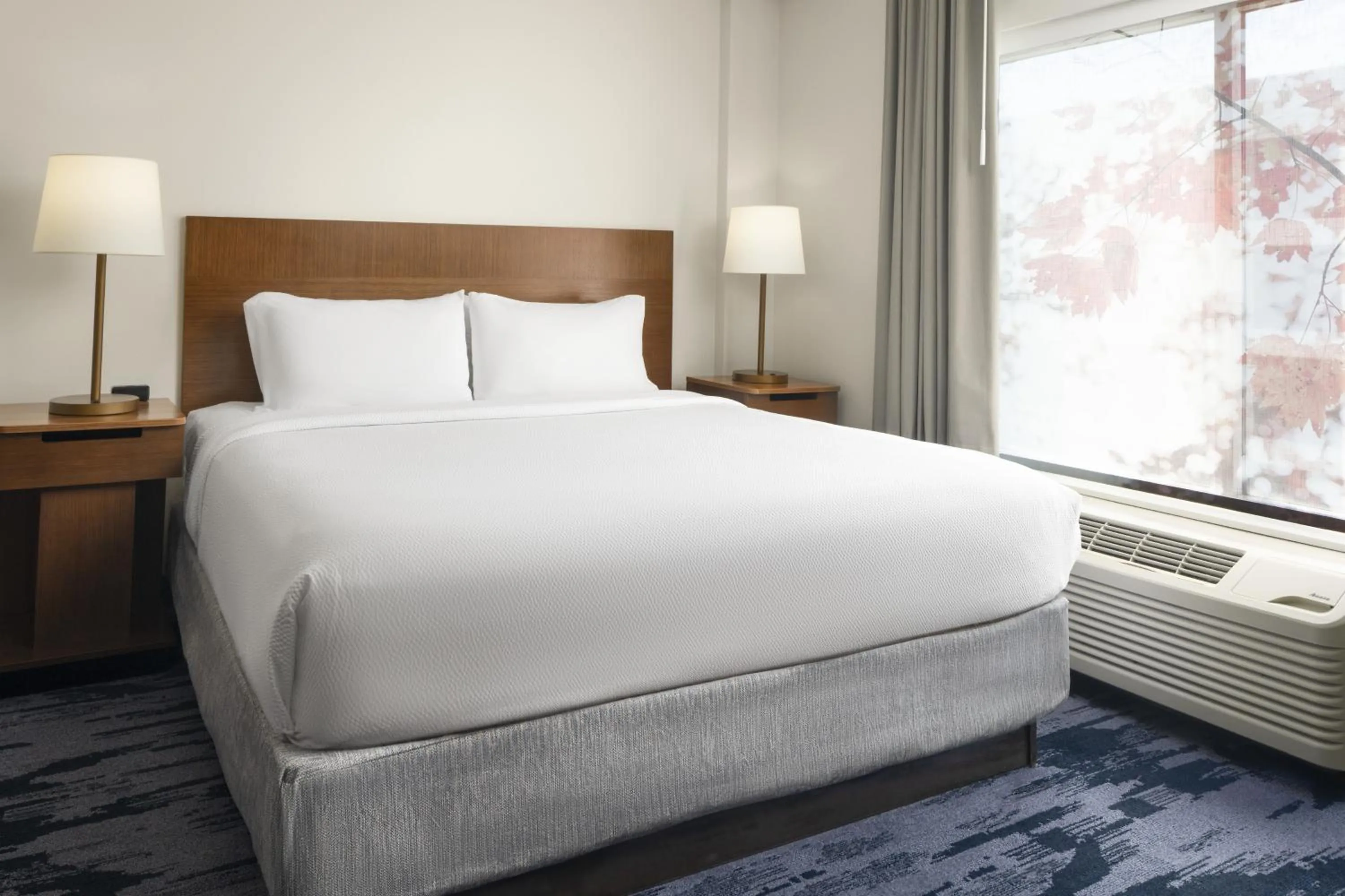 Bed in Fairfield Inn & Suites by Marriott Newark Liberty International Airport