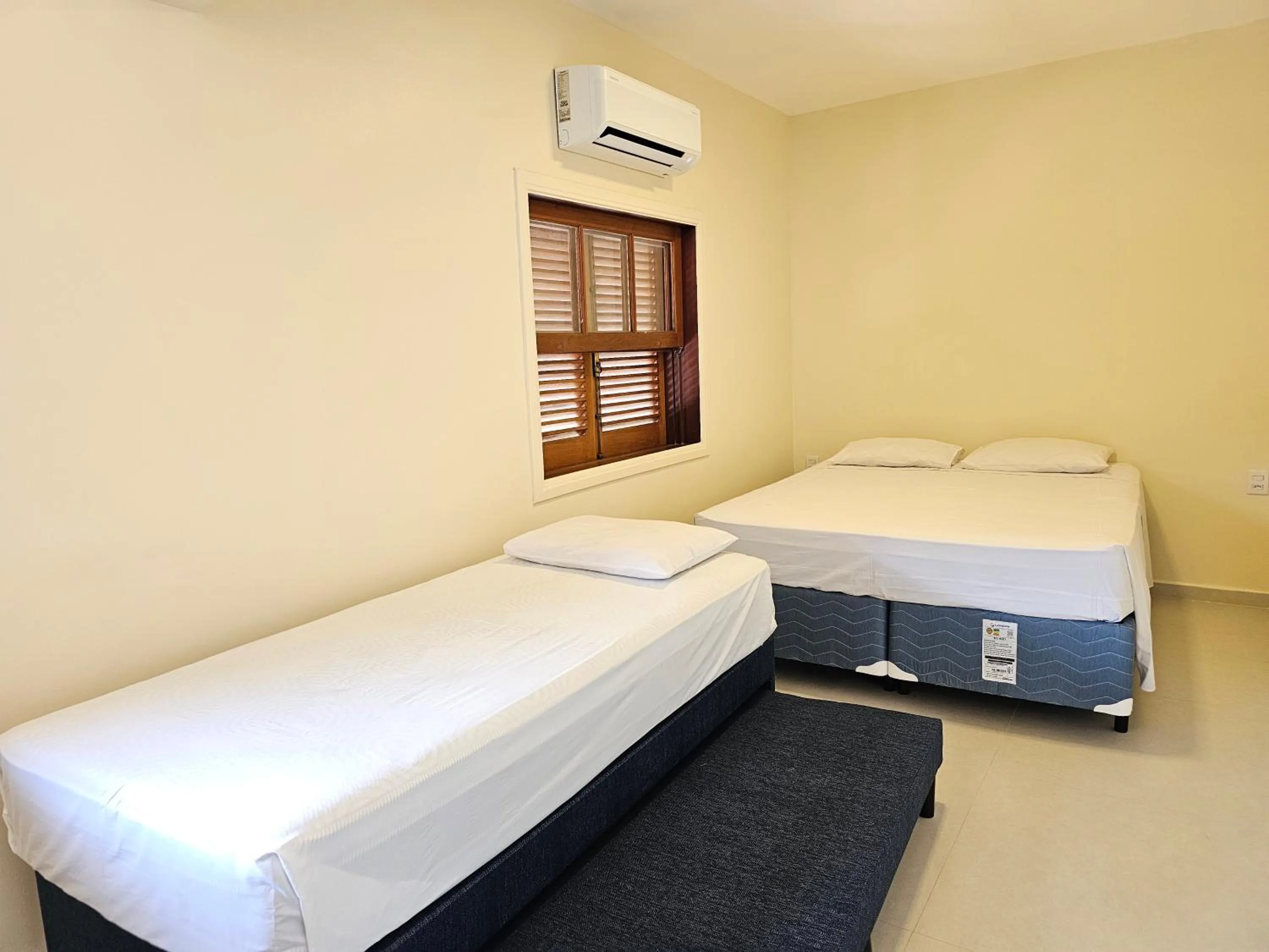 Bed in Ilha Flat Hotel