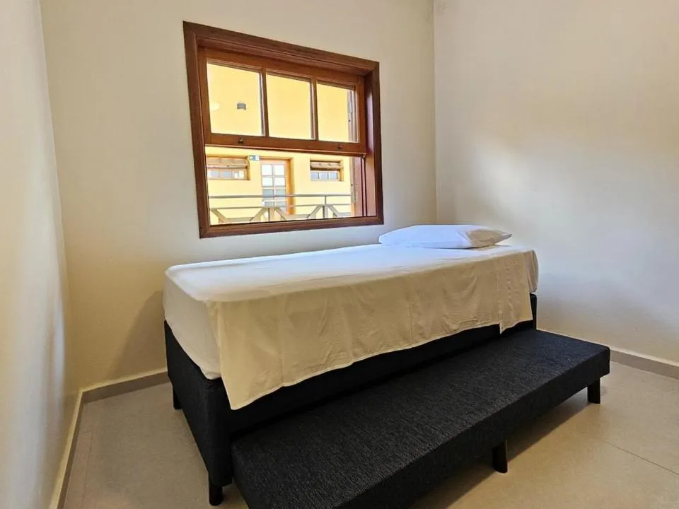 Bed in Ilha Flat Hotel