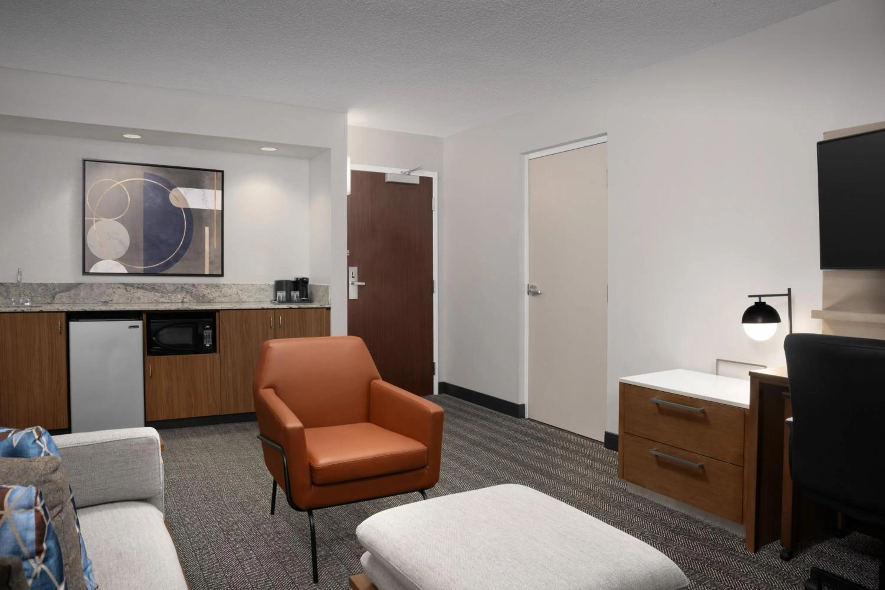 Living room in Courtyard by Marriott Orlando East/UCF Area