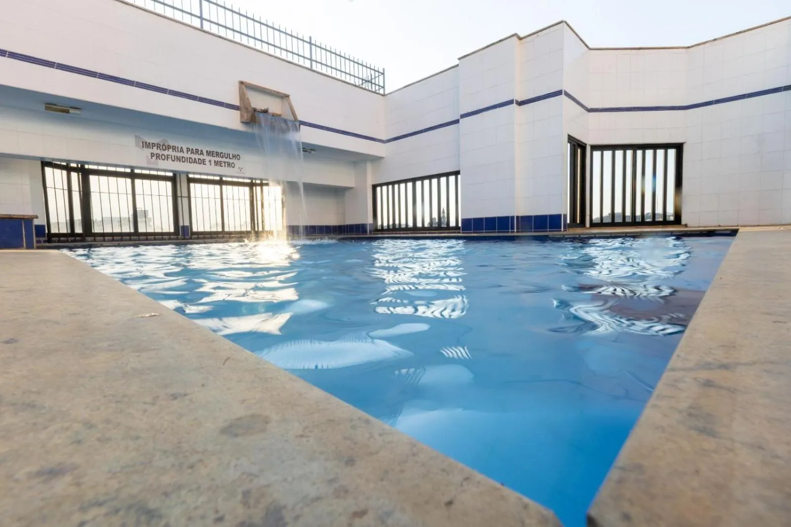 Swimming pool in Hotel Minas Tower Leopoldina By Samba