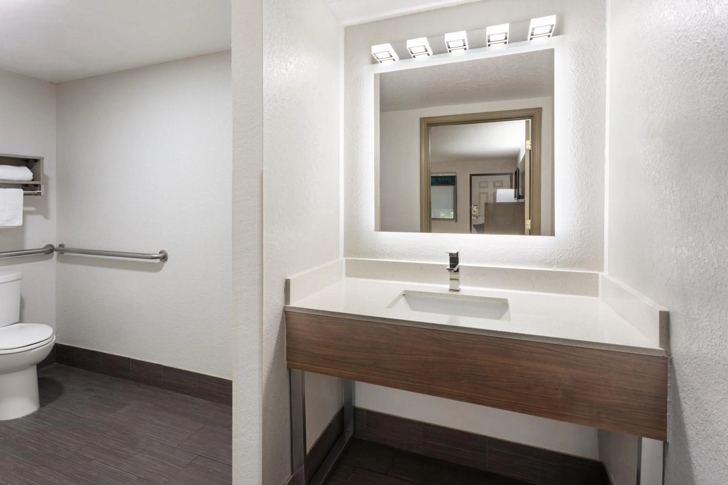 Bathroom in Super 8 by Wyndham Prattville Montgomery