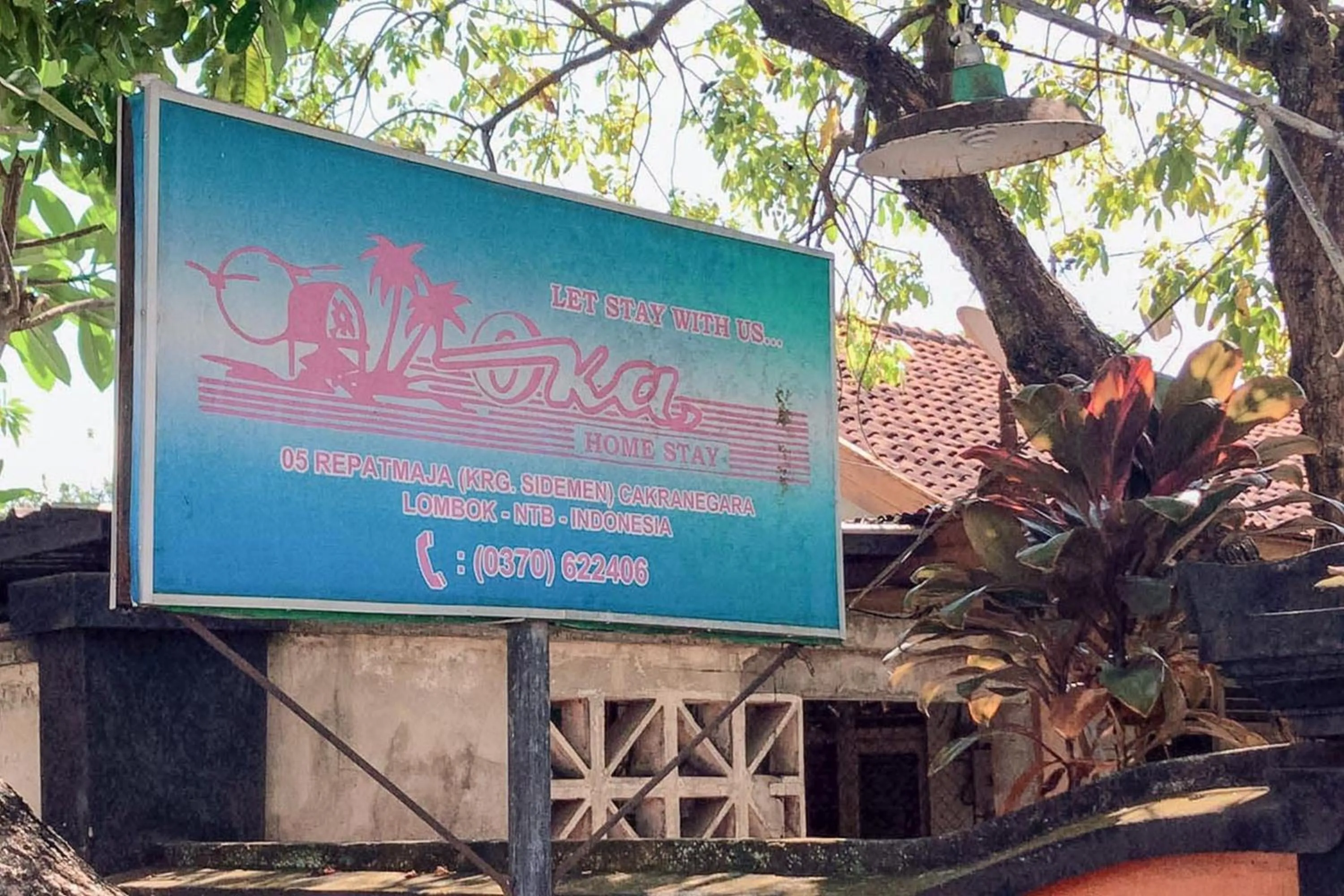 Property logo or sign in Oka Homestay Mitra RedDoorz