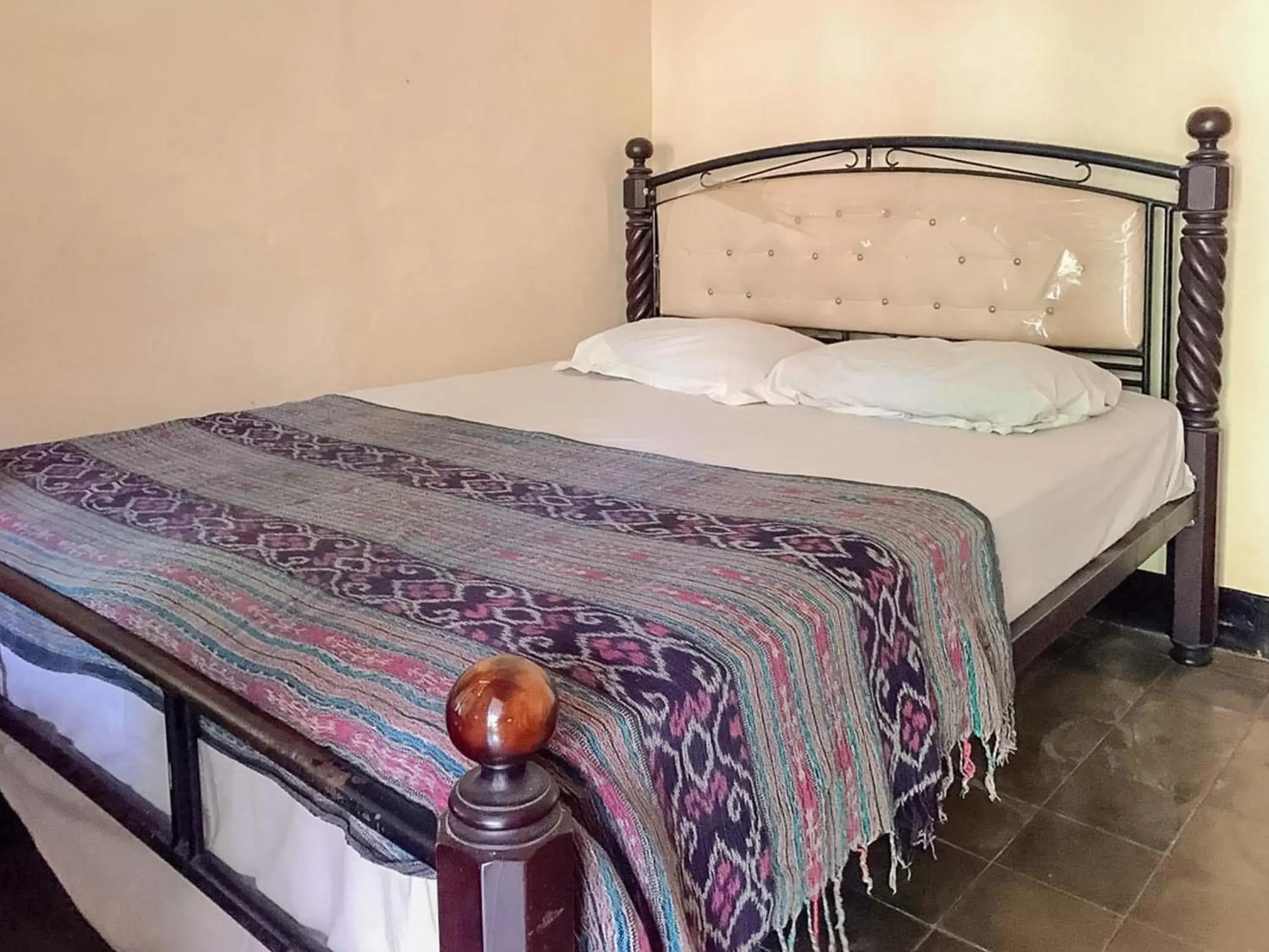 Bedroom, Bed in Oka Homestay Mitra RedDoorz Bedroom, Bed in Oka Homestay Mitra RedDoorz