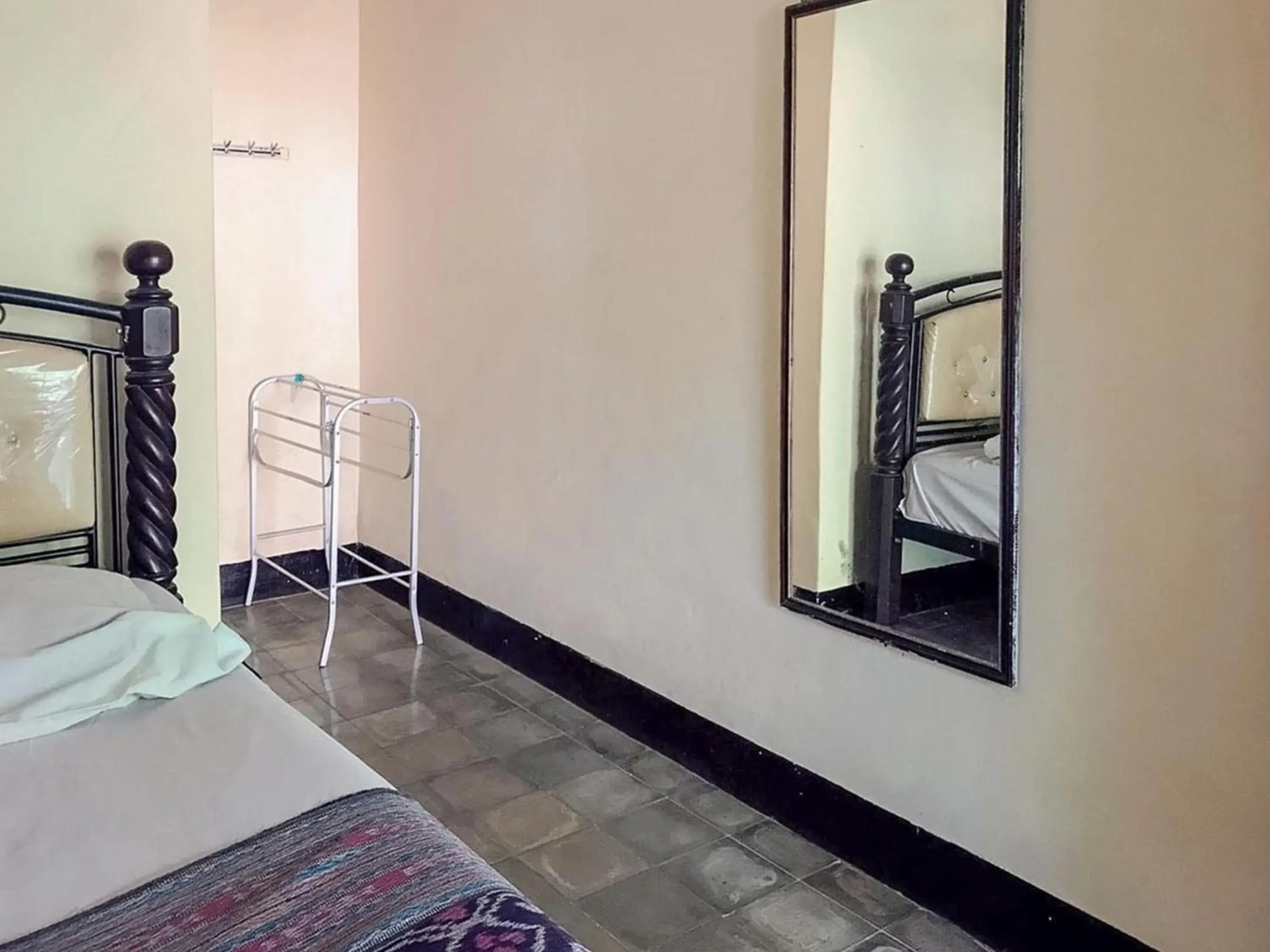 Bedroom, Bed in Oka Homestay Mitra RedDoorz Bedroom, Bed in Oka Homestay Mitra RedDoorz