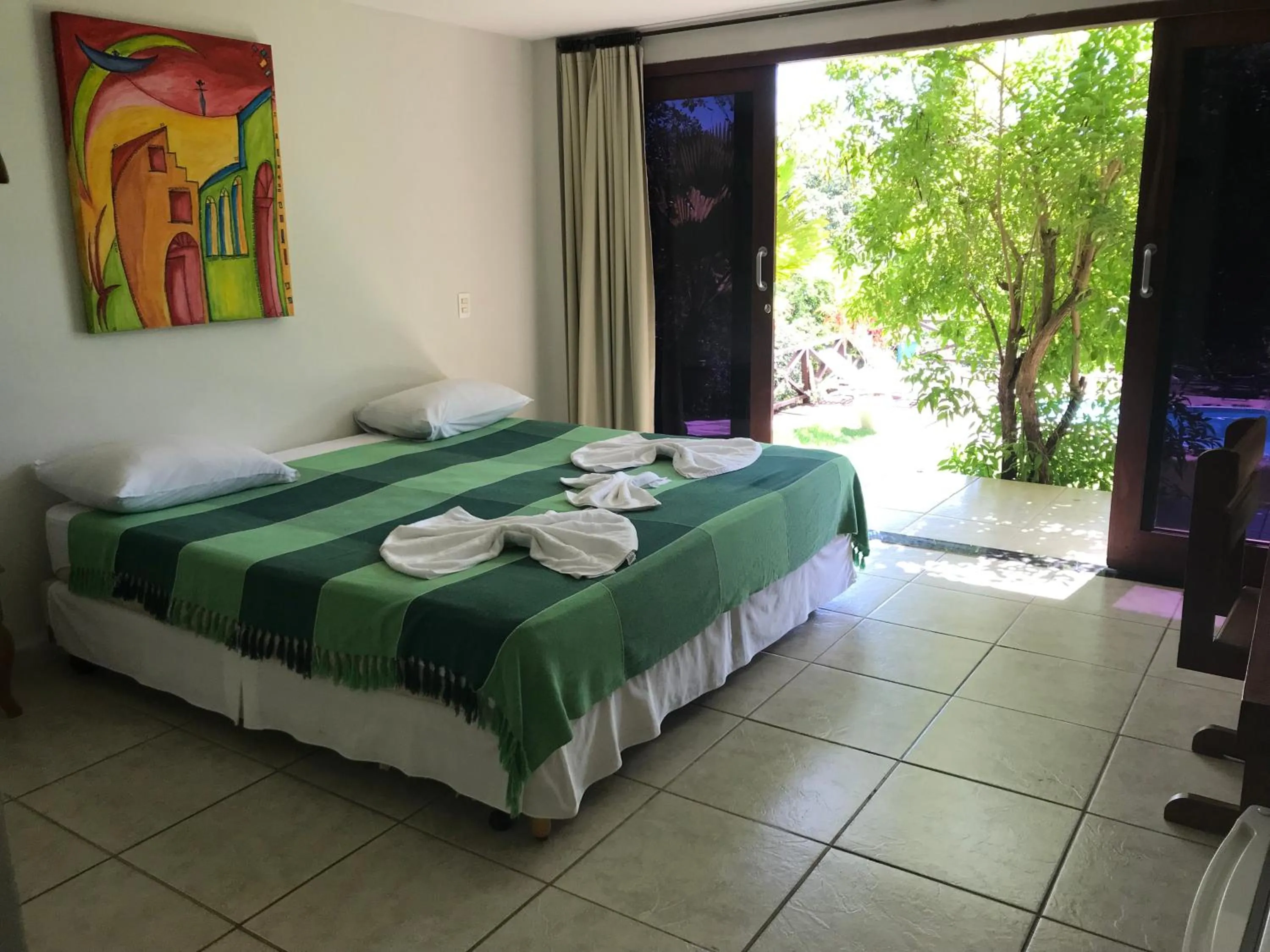 Bed in Pousada Mãe Natureza