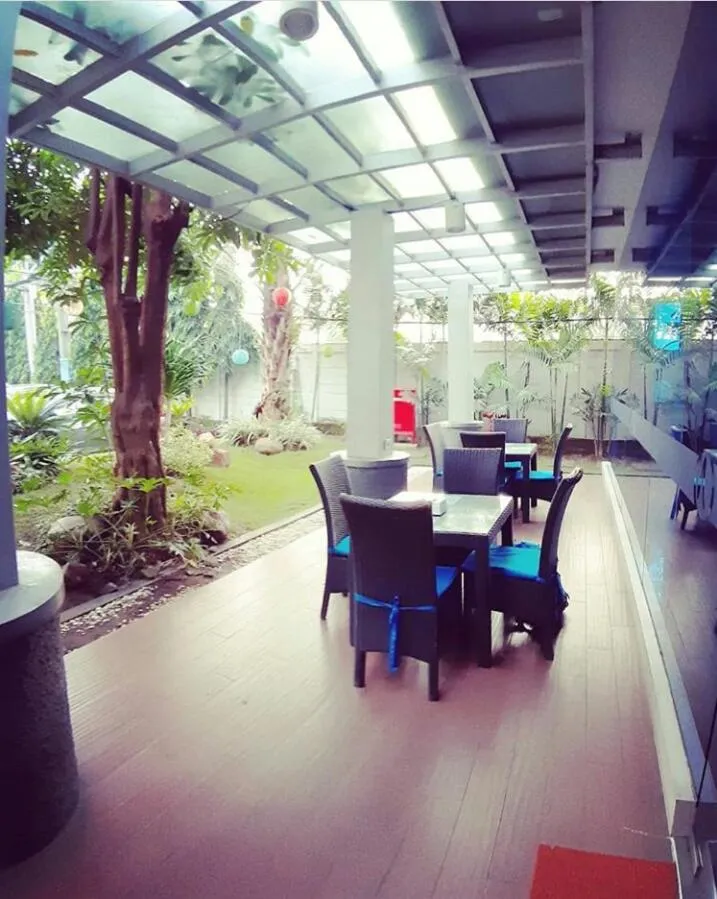 Dining area in News Hotel by Graha Pena Jawa Pos