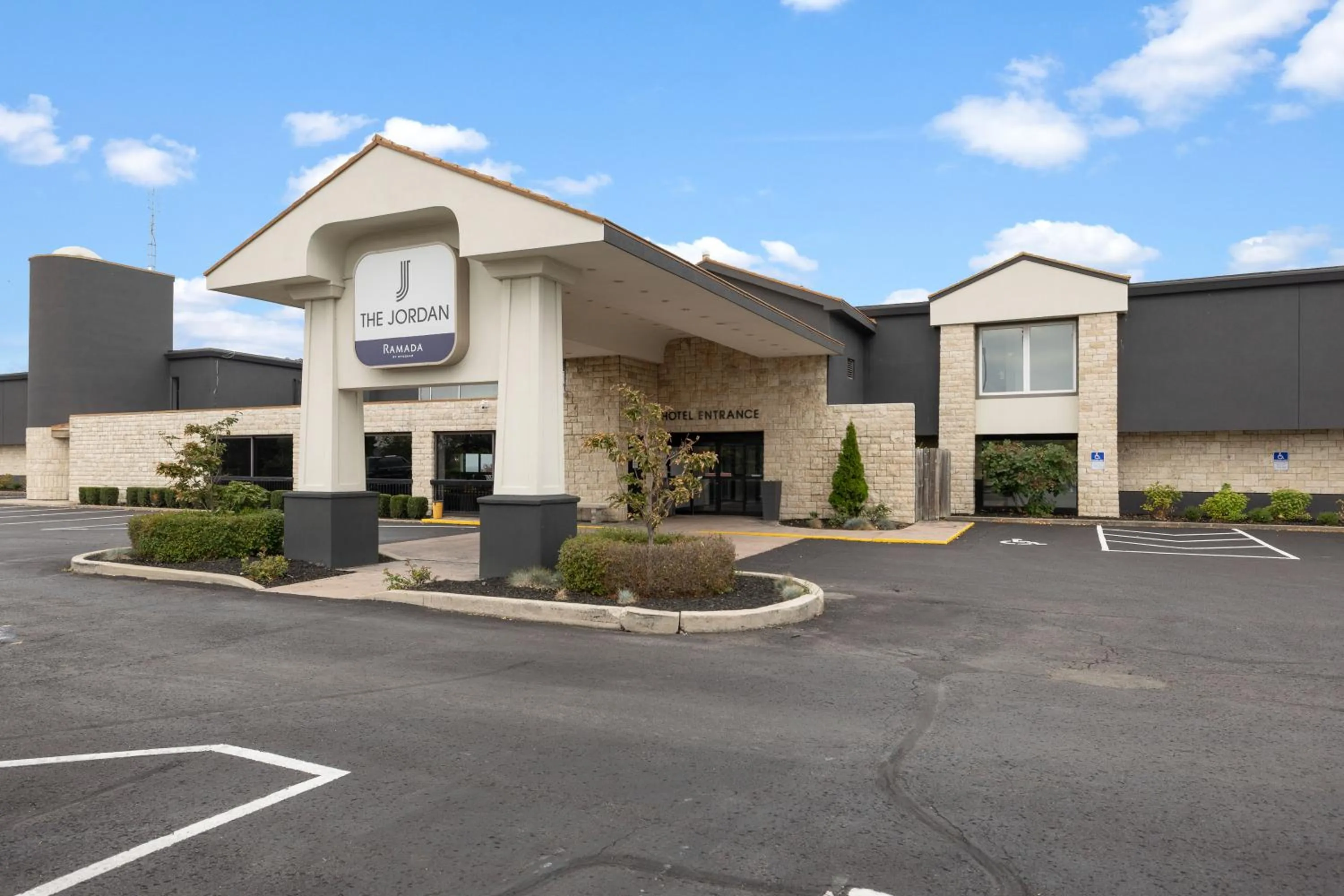 Property building in The Jordan Hotel Ramada by Wyndham