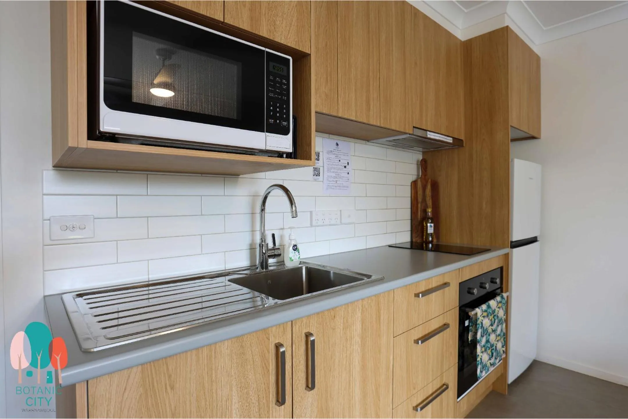Kitchen or kitchenette in Botanic City Apartments