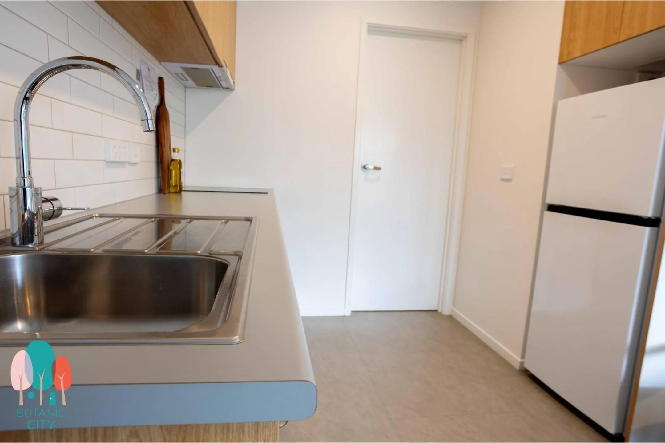 Kitchen or kitchenette in Botanic City Apartments