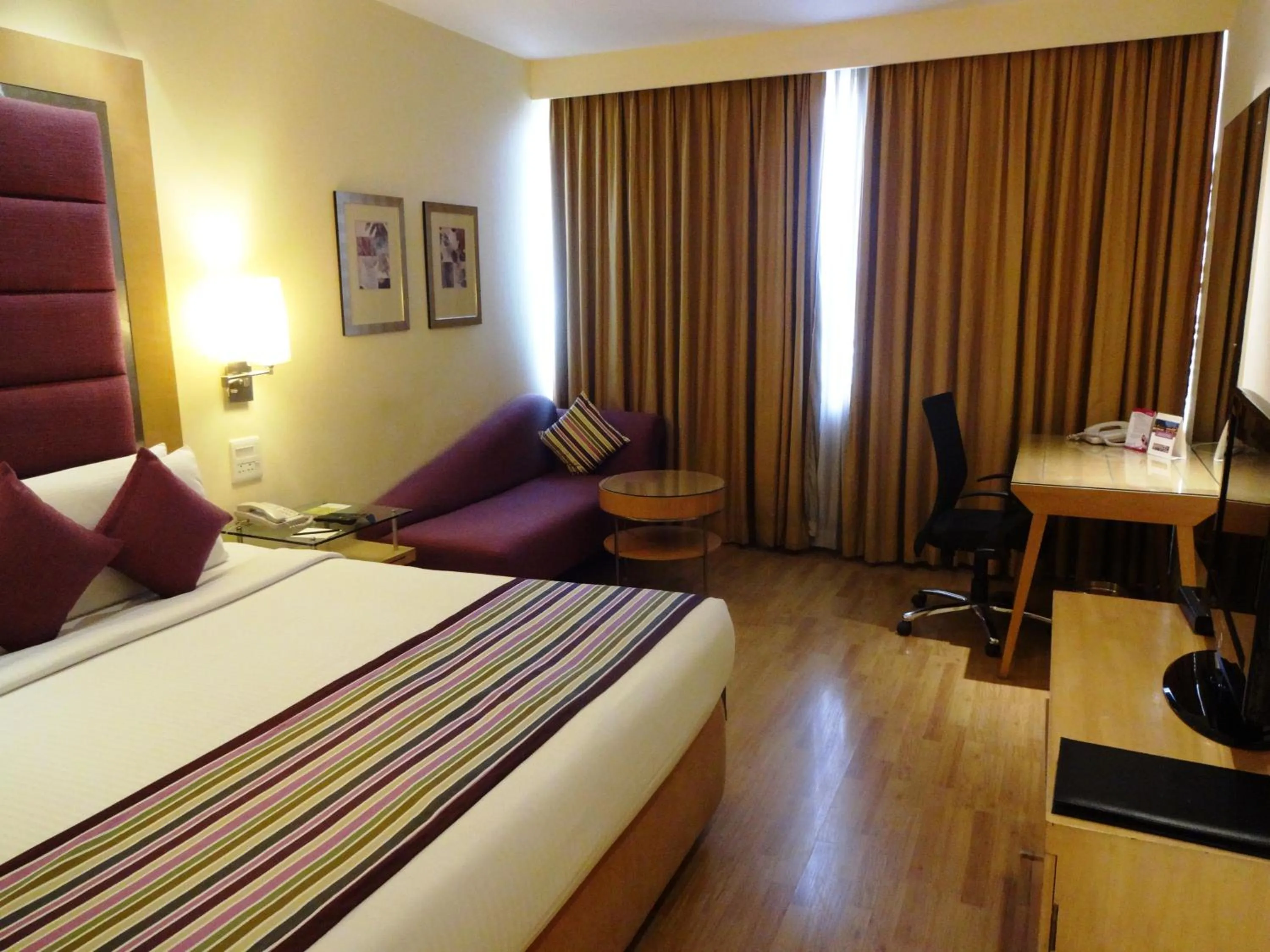 Photo of the whole room, Bed in Royal Orchid Central Bangalore, MG Road