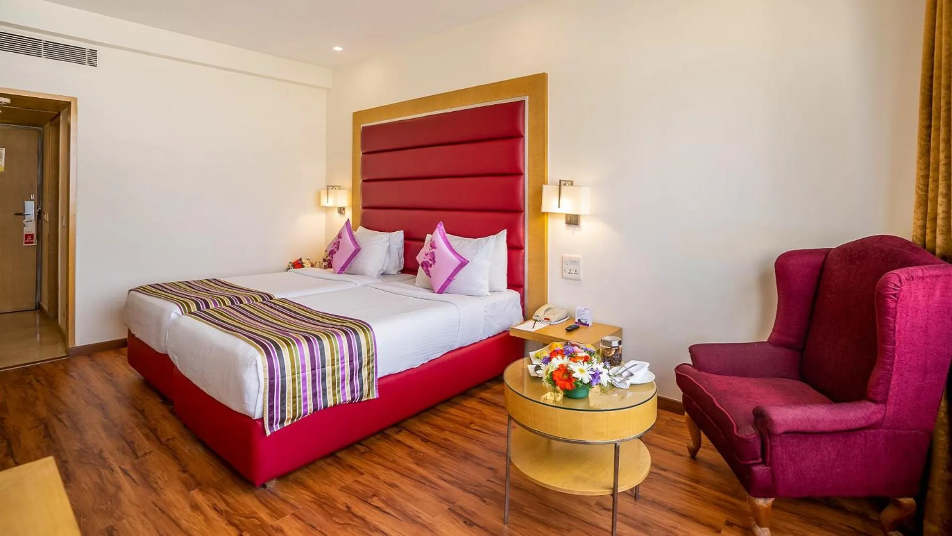 Bedroom, Bed in Royal Orchid Central Bangalore, MG Road