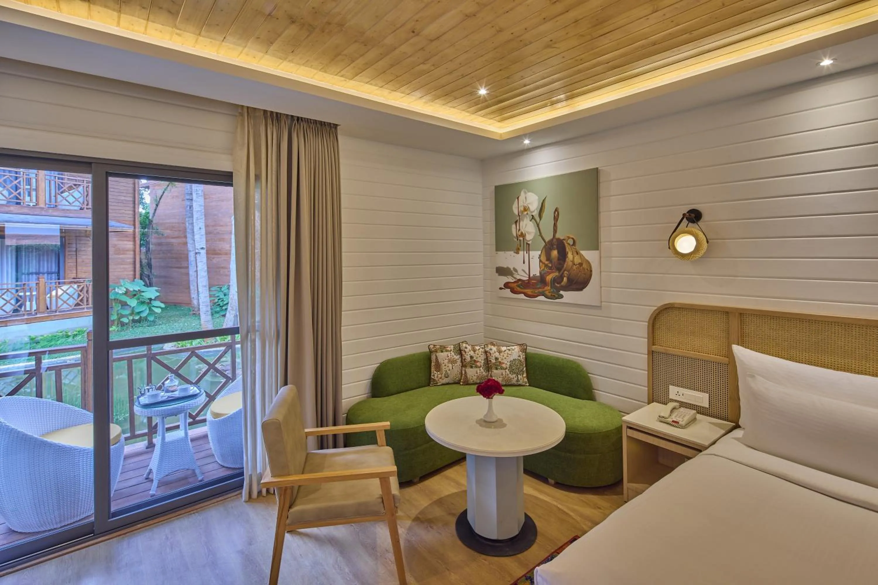 Living room, Bed in Royal Orchid Resort & Convention Centre, Yelahanka Bangalore