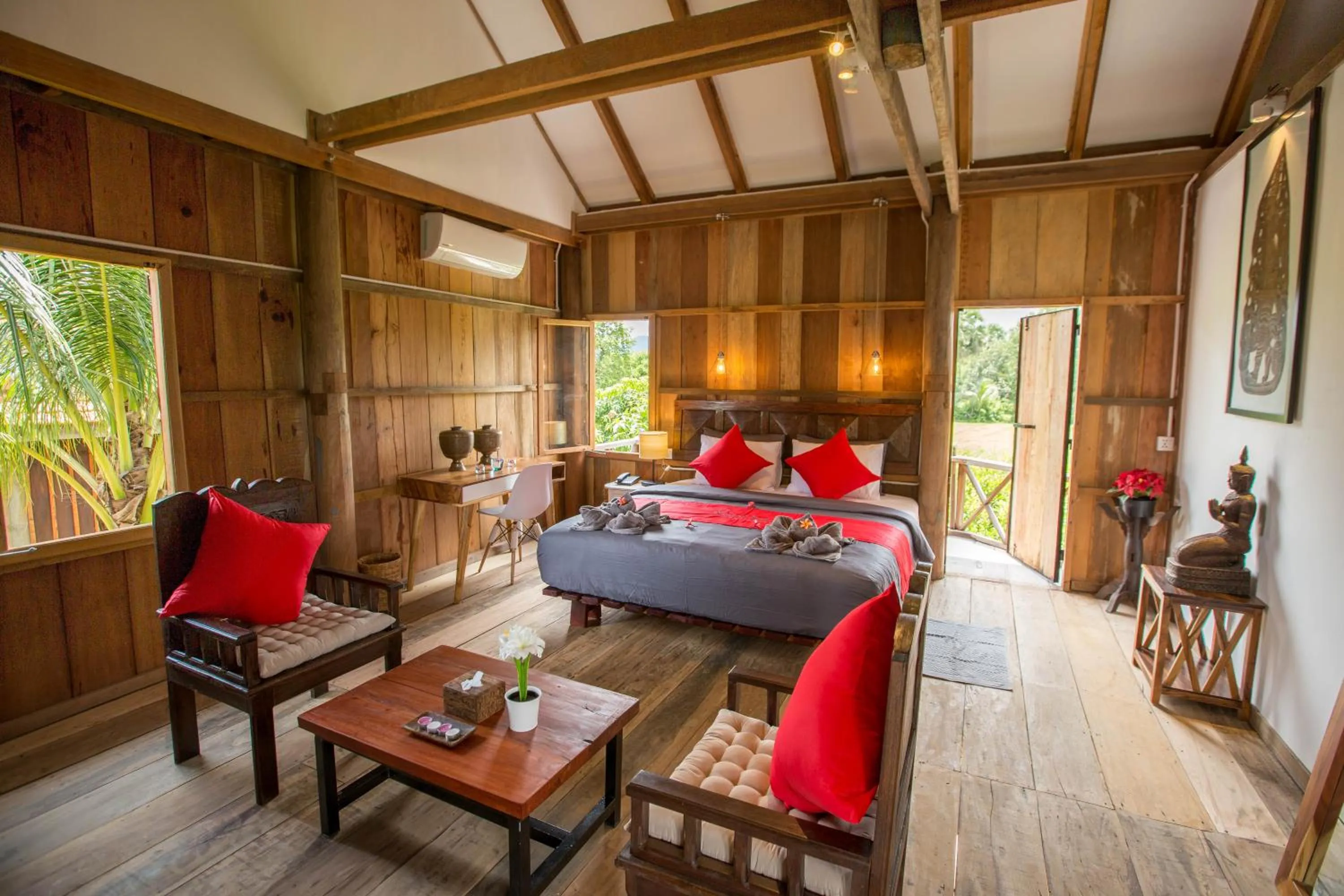 Seating area, Bed in Kampot River Residence