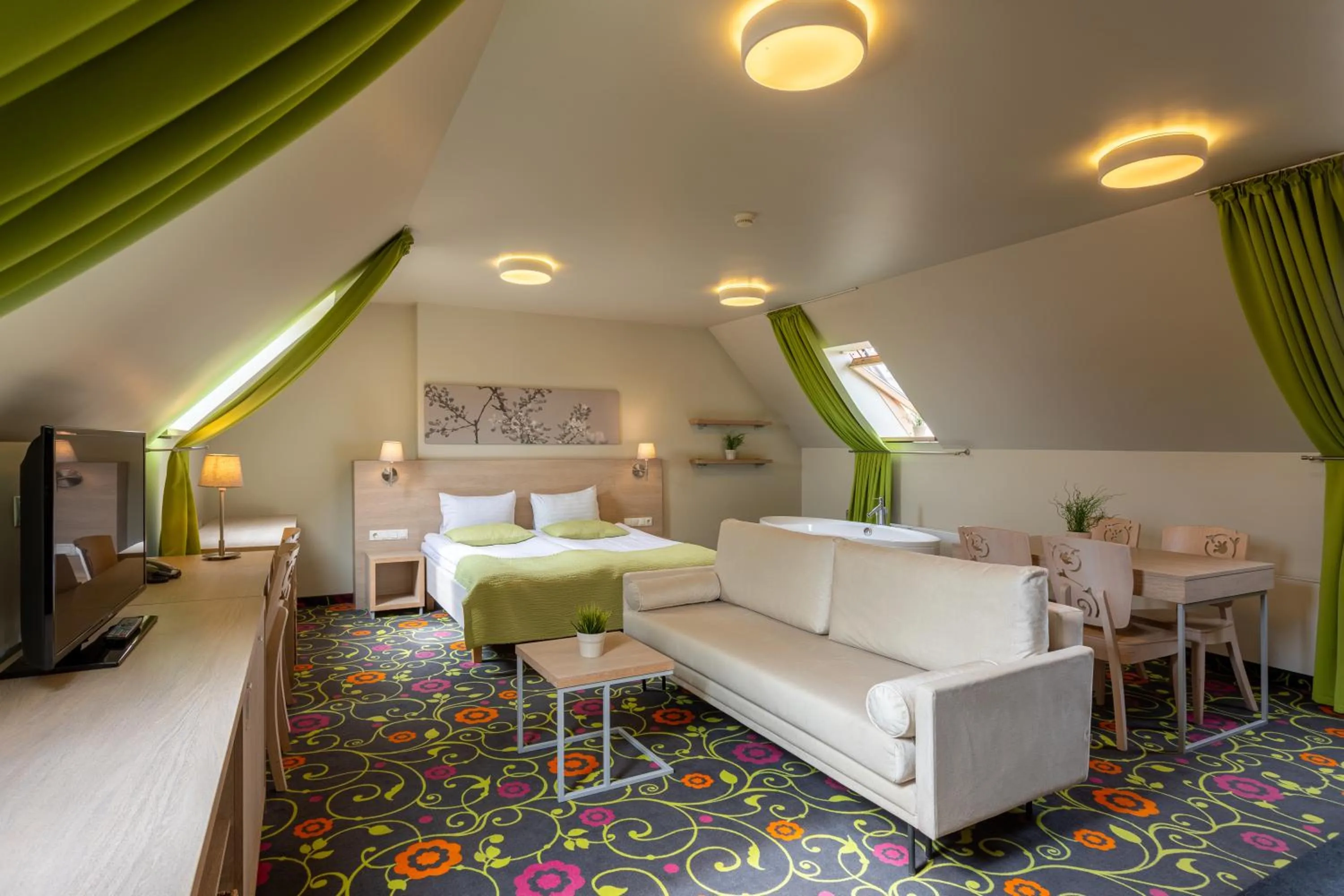 Living room, Bed in City Hotels Rūdninkai