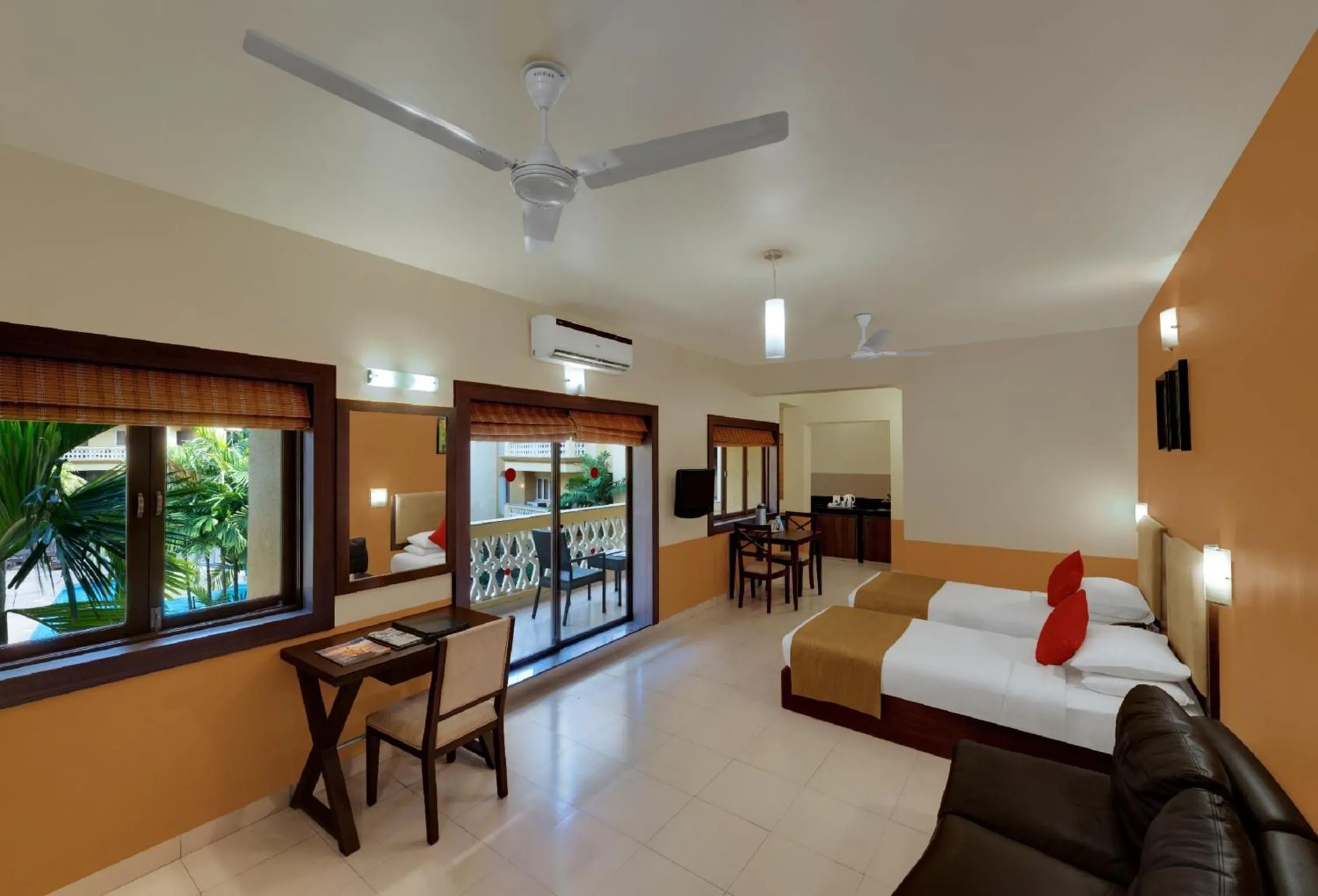 Bed in Sandalwood Hotel & Suites
