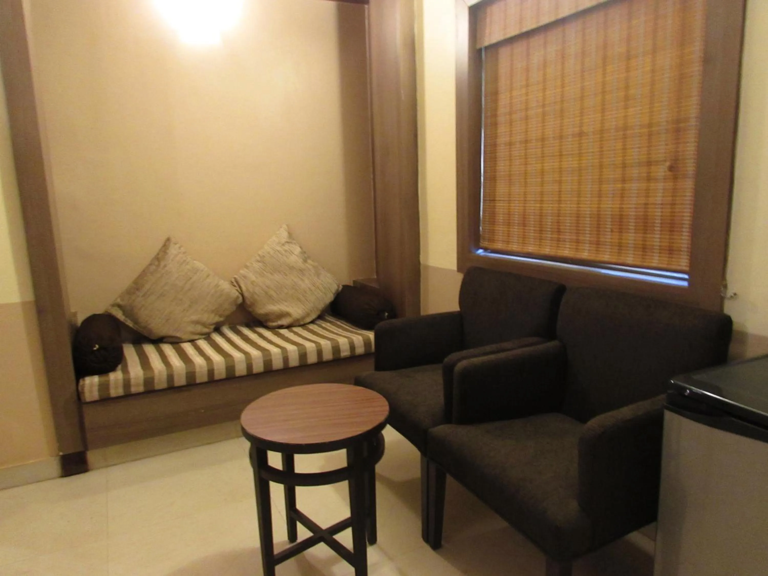Living room in Sandalwood Hotel & Suites