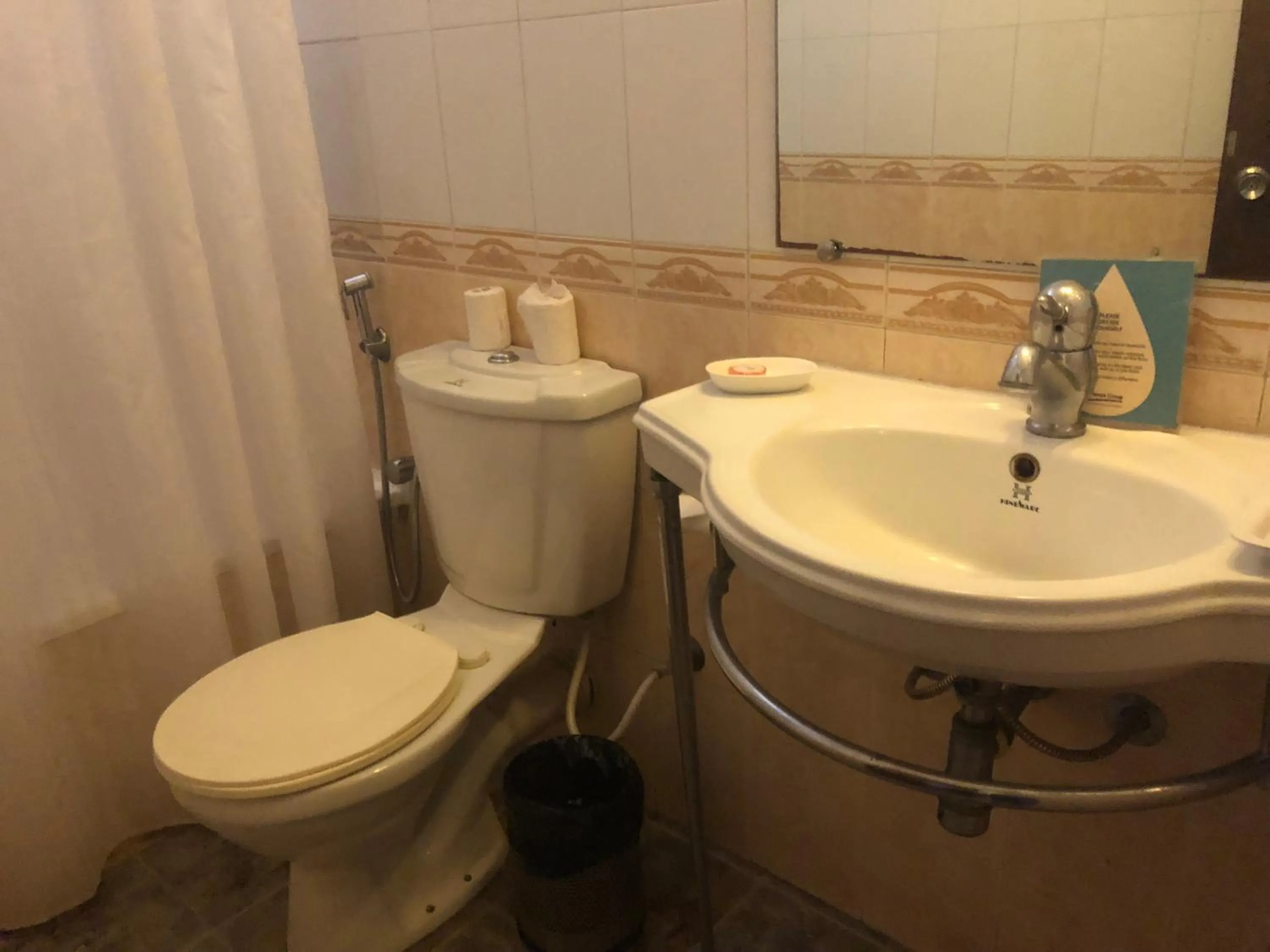 Toilet in Pride Sun Village Resort & Spa